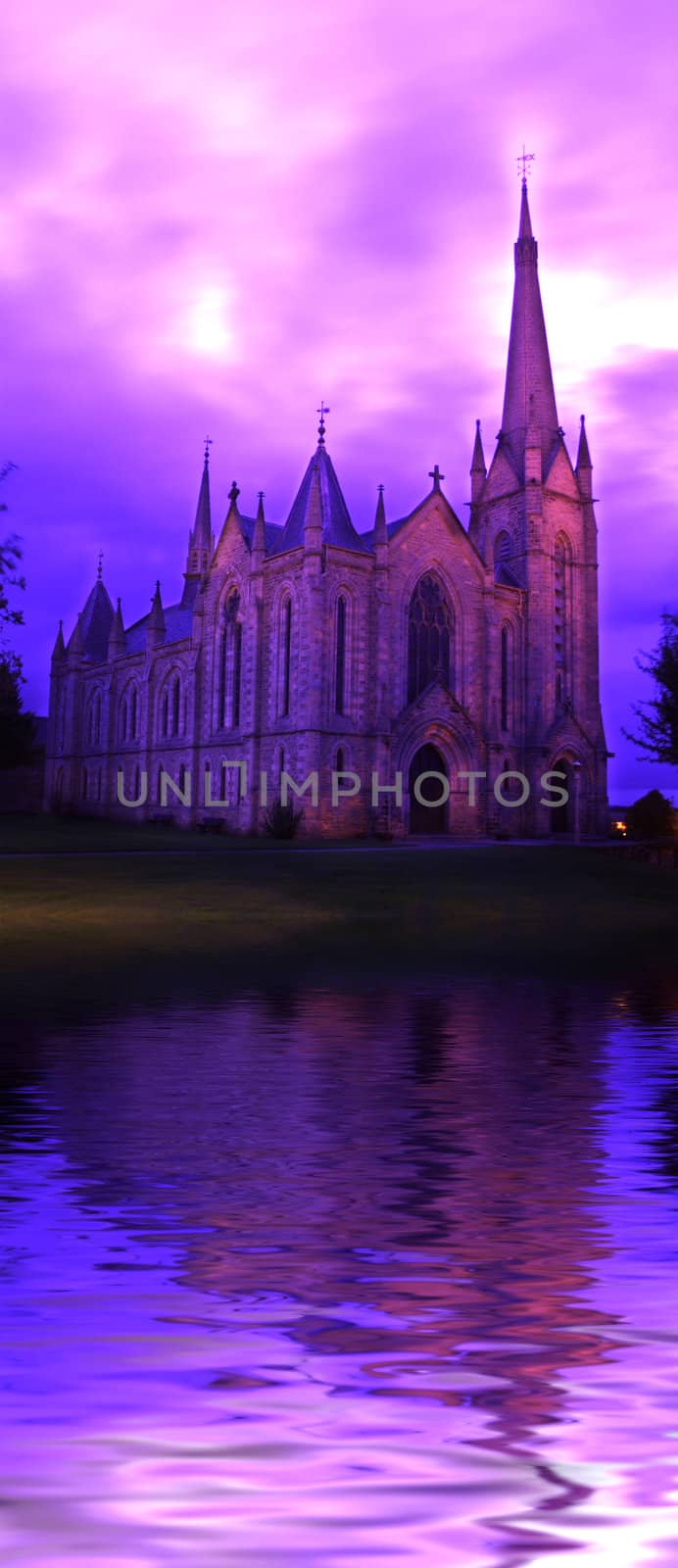 The Parish Church of Saint Laurence, with a gorgeous (and original), purple sky. 

(with water reflection)