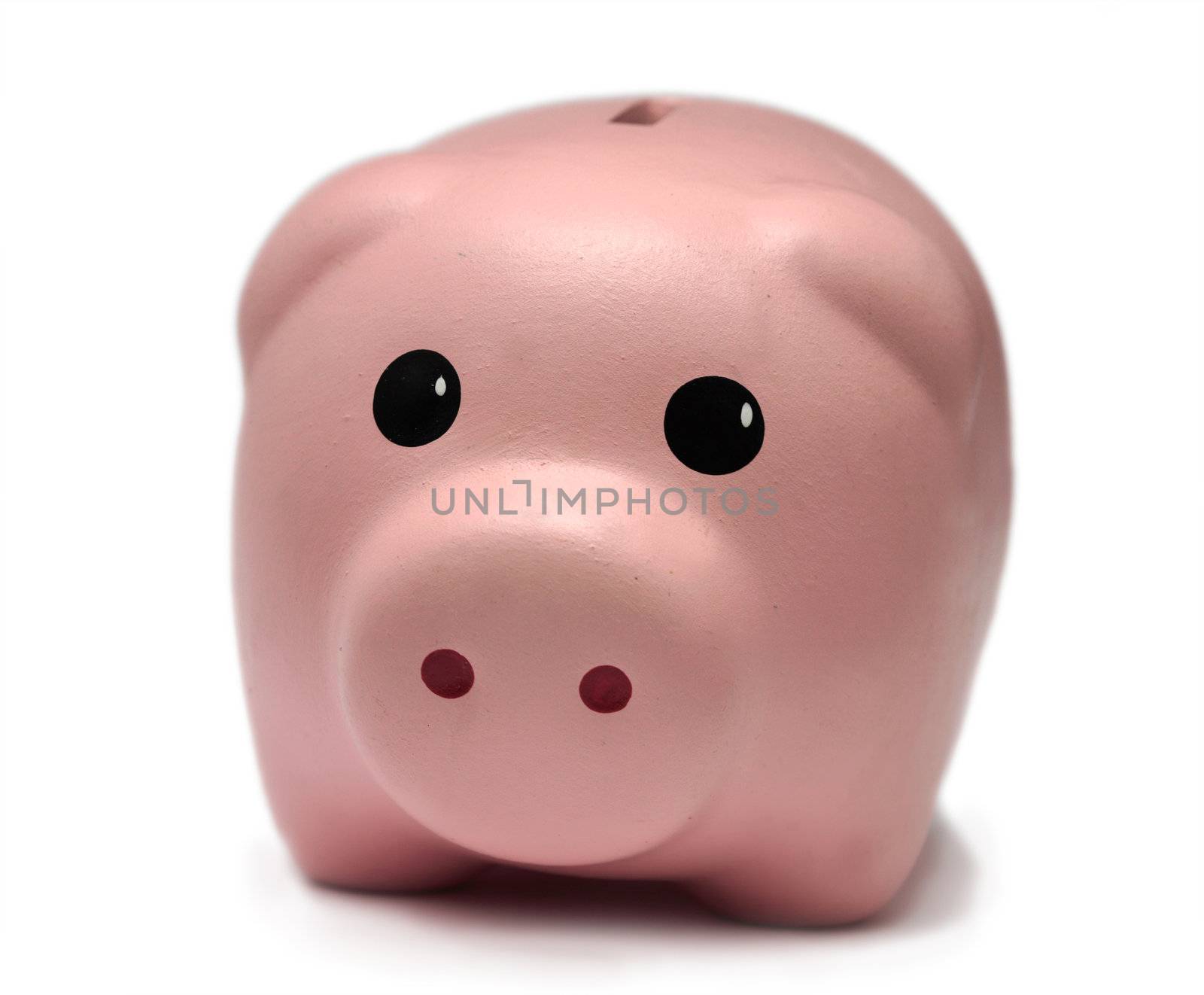 A cute piggy bank isolated on a white background.