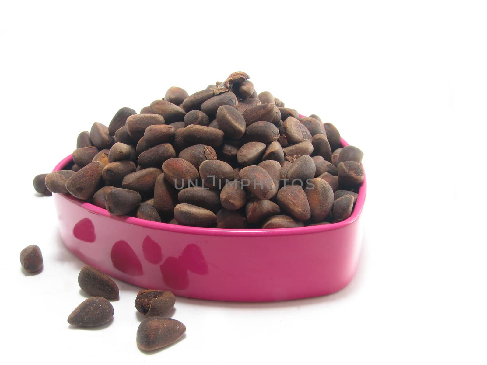 Coffee beans in a pink box, in the form of heart