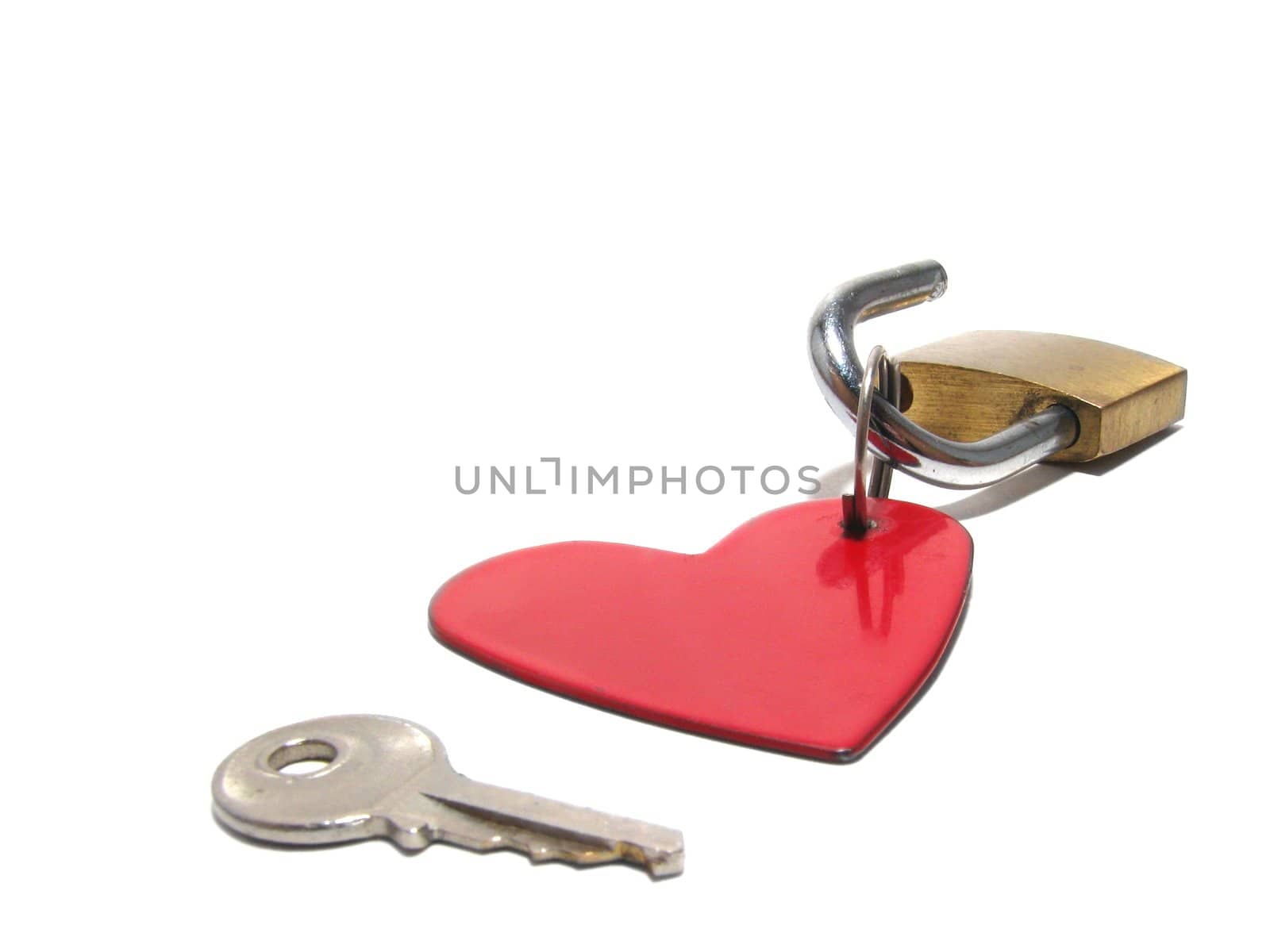 Valentine, a composition from heart, the padlock, and key. It is isolated on a white background
