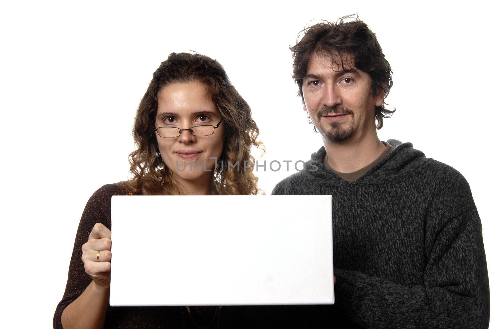 Young couple holding a card, isolated on white