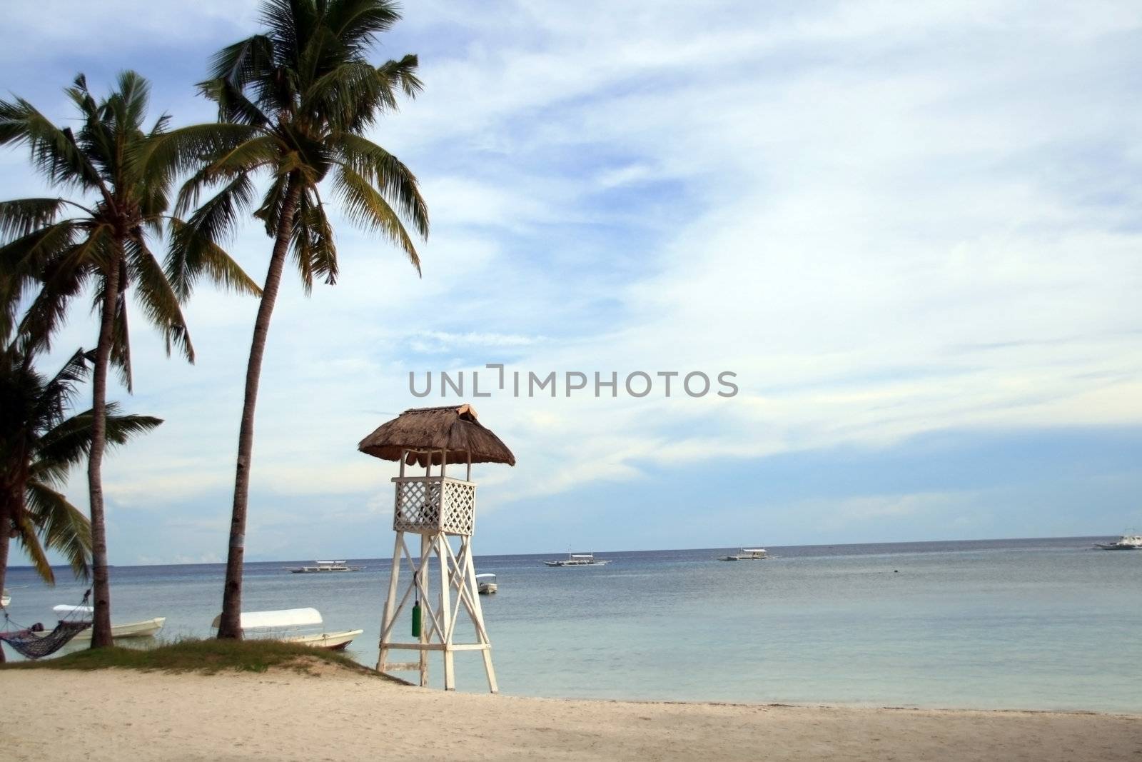 tall lifeguard watch tower at the beach
