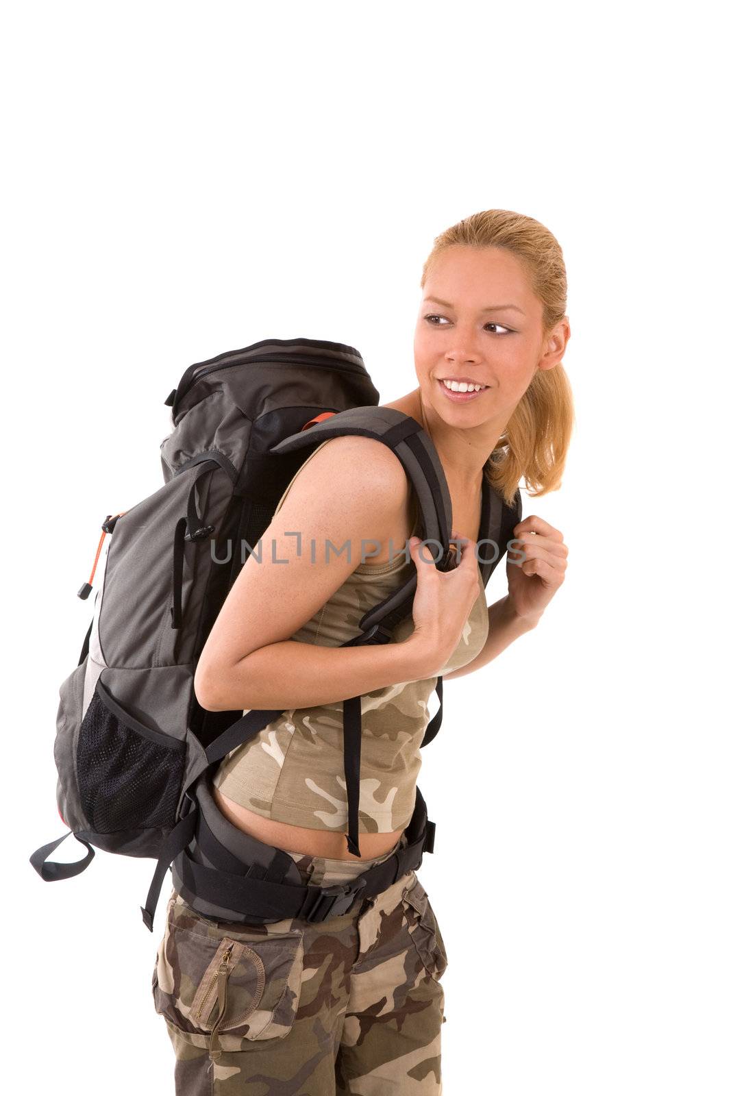 Beautiful young blond girl with backpack ready to travel