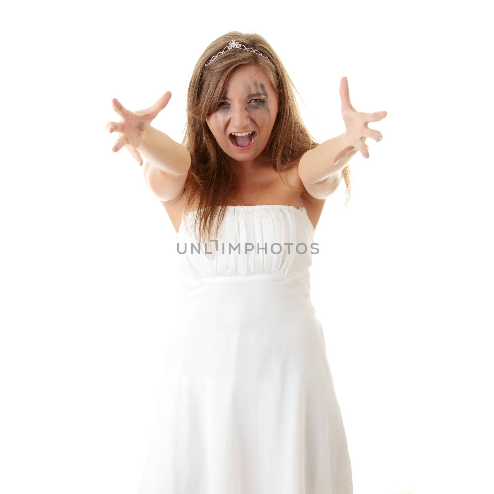 Young angry princess in white dress - focus on face
