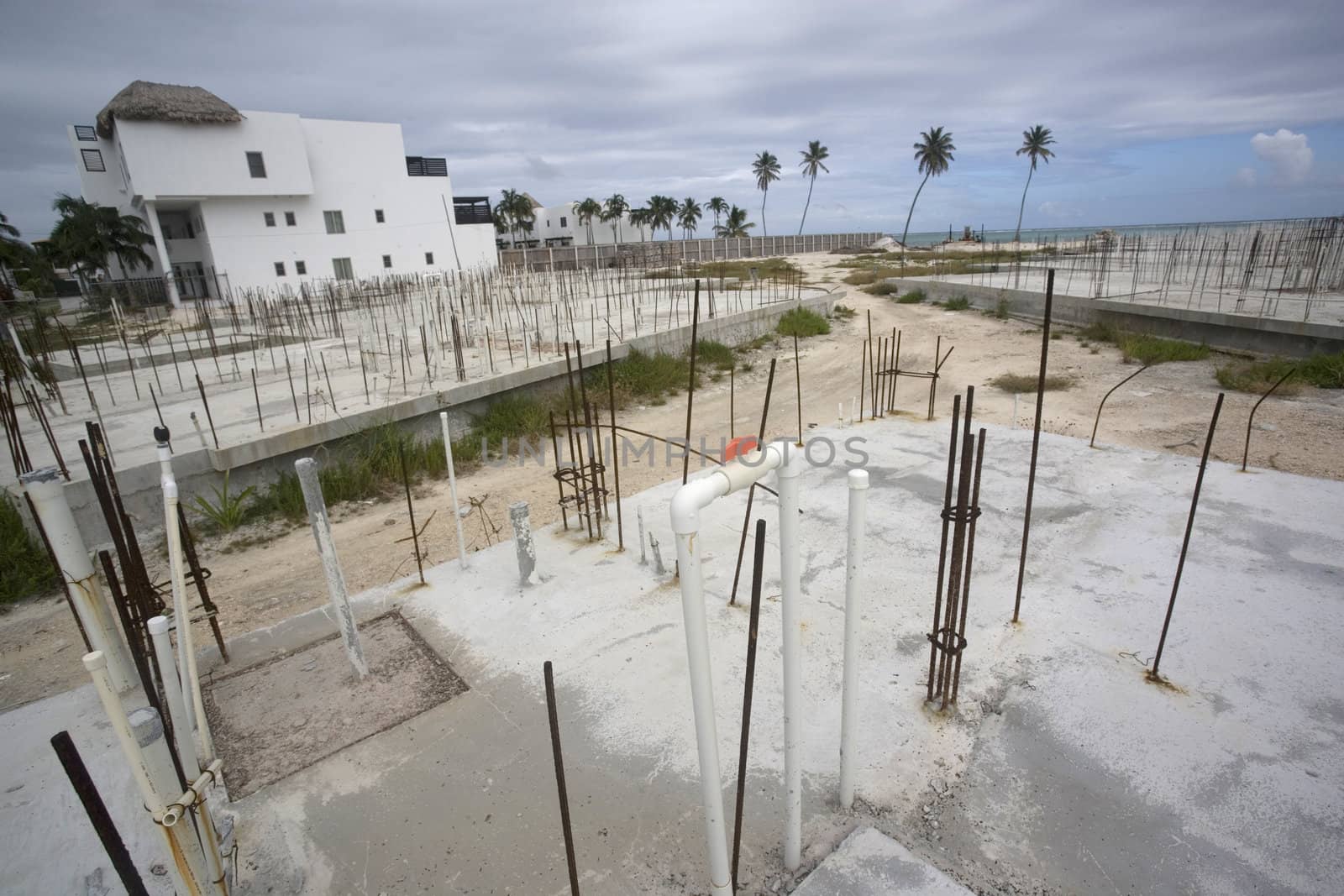 An empty construction site on the beach in the warm tropics of the Gulf of Mexico.