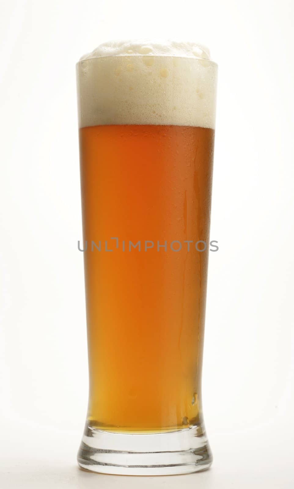 cold glass with beer with white background
