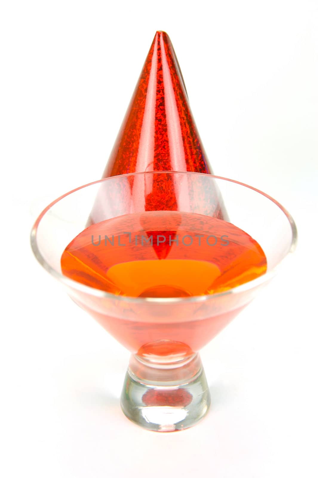 Cosmopolitan cocktails and party favours isolated against a white background