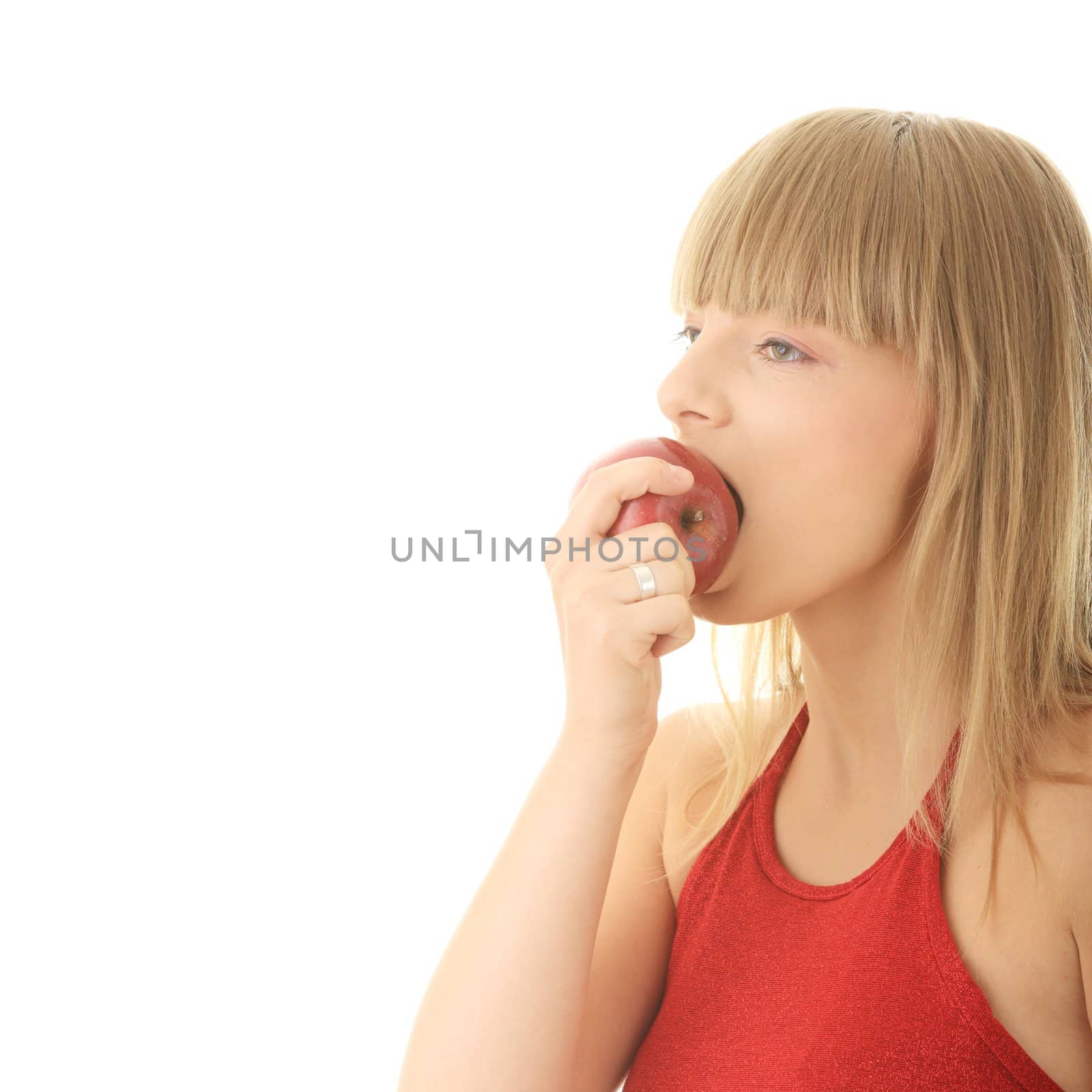 Young blond woman with red apple isolated on white background - healthy concept
