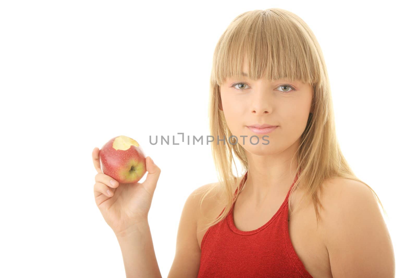 Young blond woman with red apple isolated on white background - healthy concept