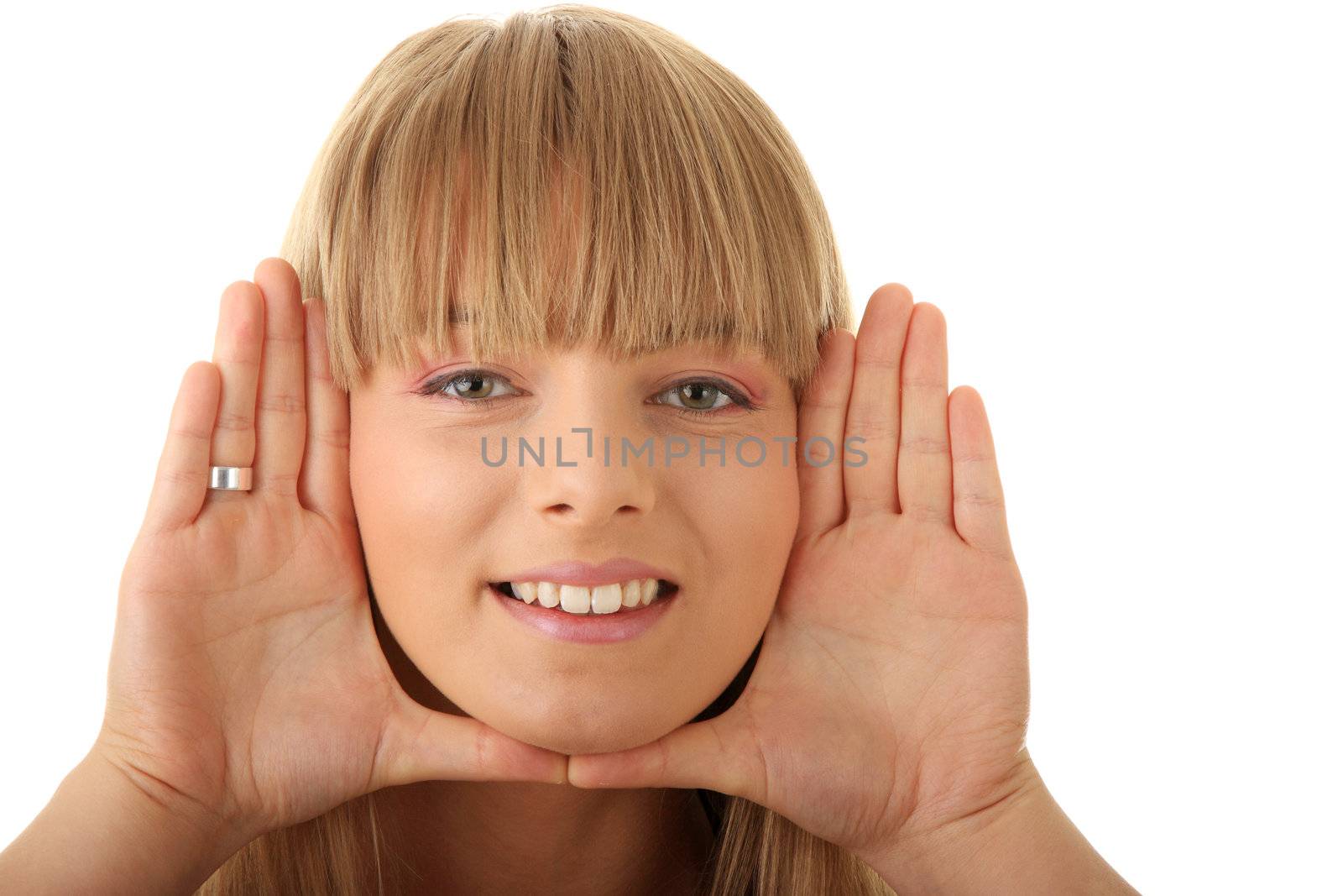 Young woman frame her face with hands