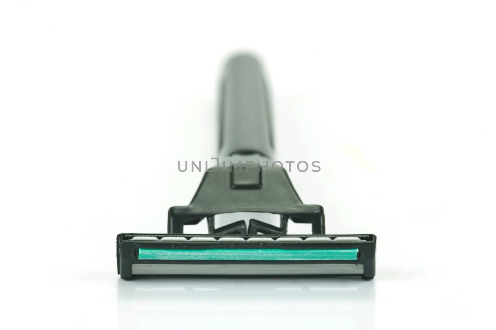 A disposable razor isolated against a white background