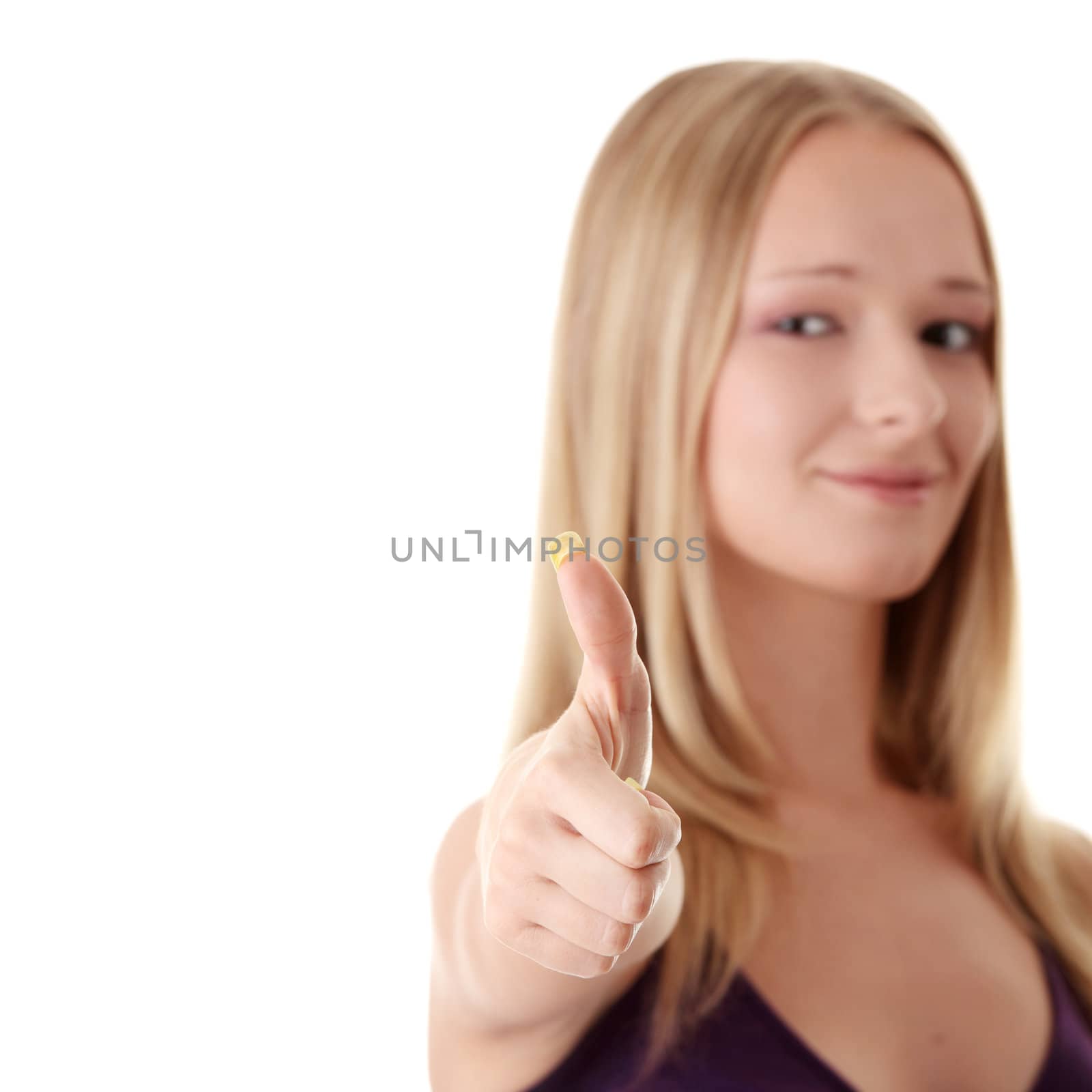 Casual woman smiling with her thumbs up - isolated by BDS