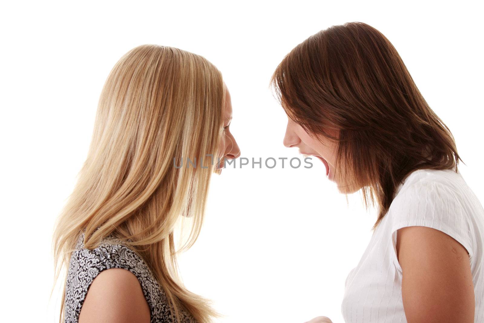 Two angry womans shouting each other isolated on white background