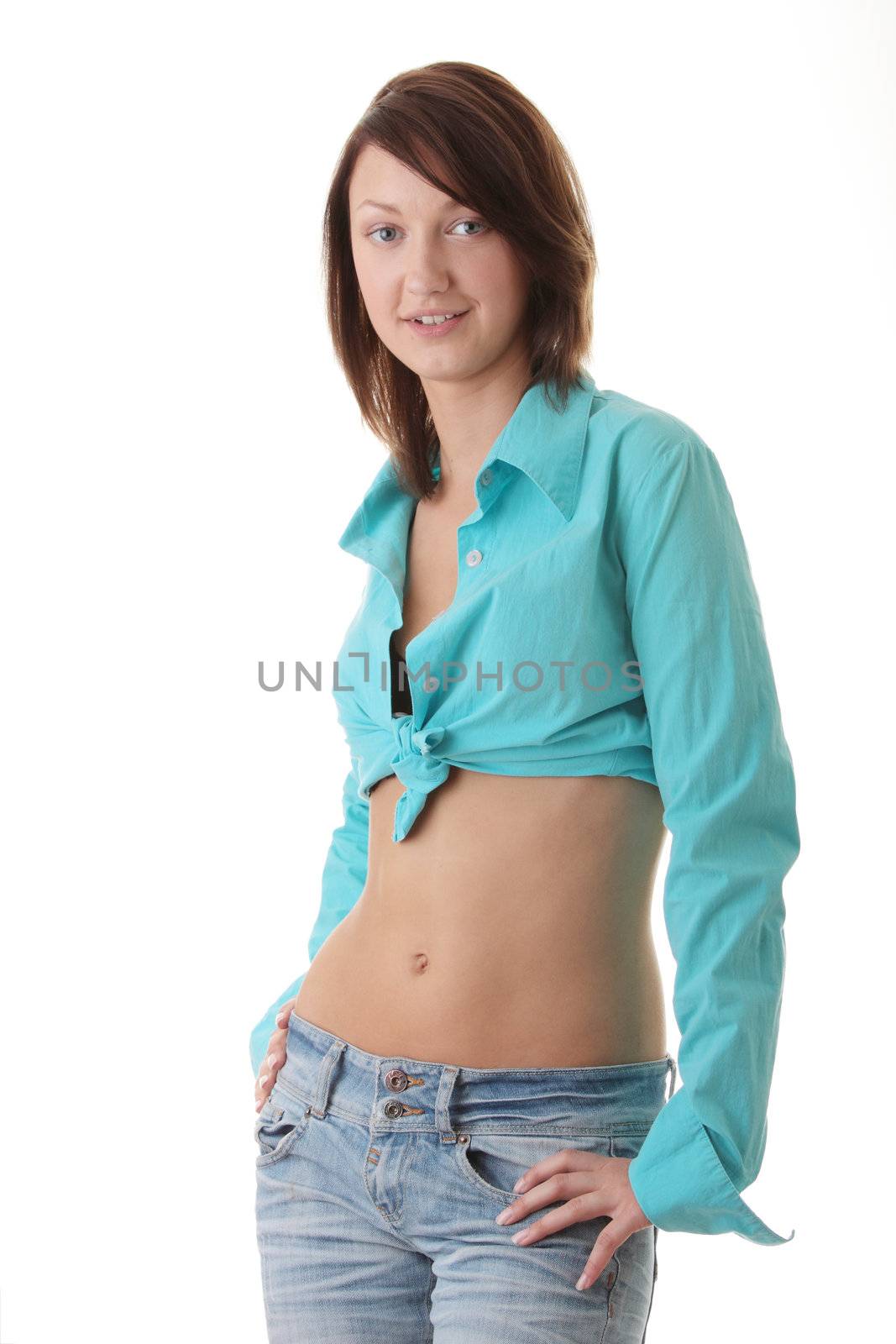 Sexy, fit woman in jeans, with naked stomach isolated on white