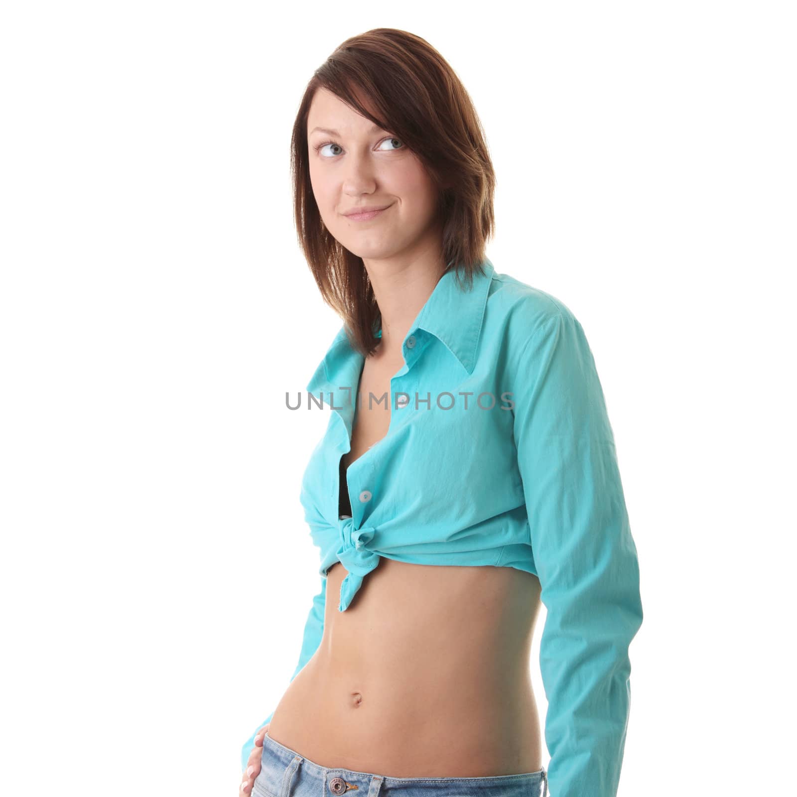 Sexy, fit woman in jeans, with naked stomach isolated on white