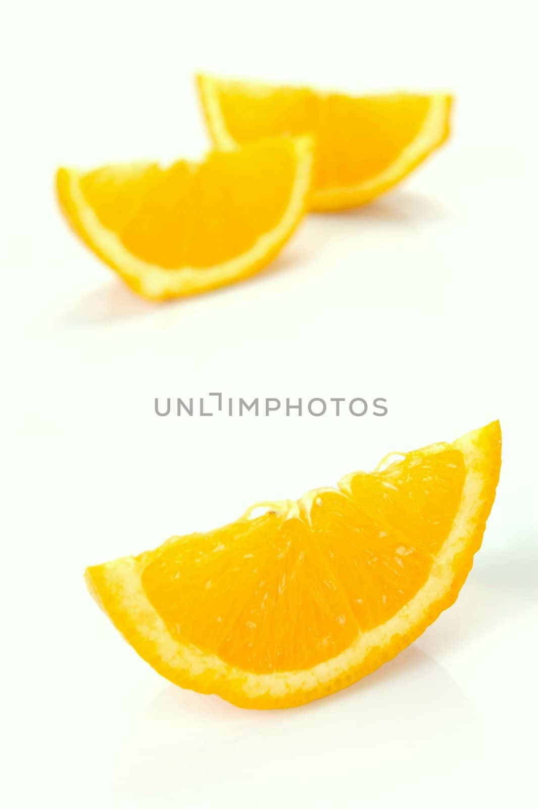 Orange quarters isolated against a white background