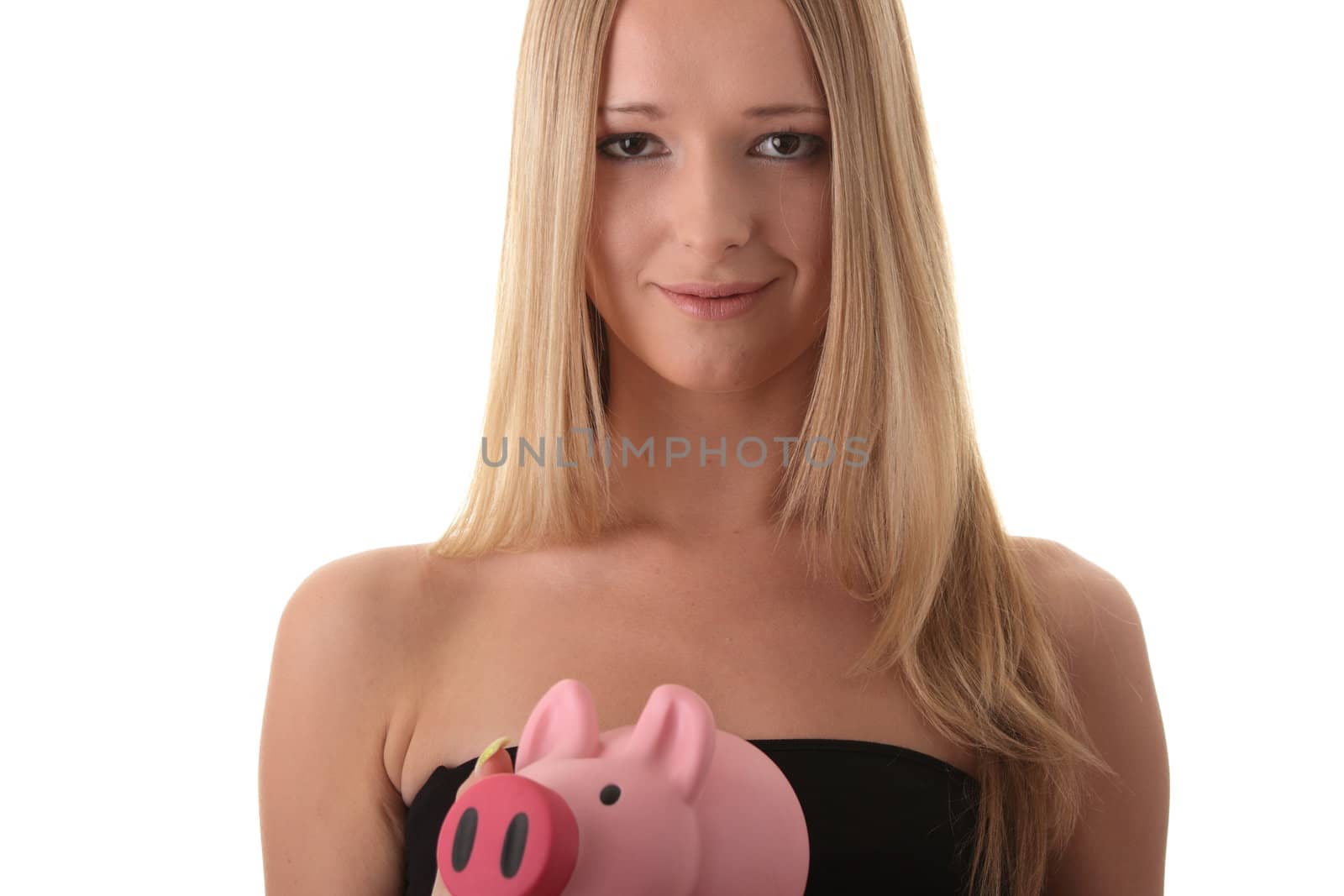 Young casual caucasian woman holding piggy-bank isolated on white background