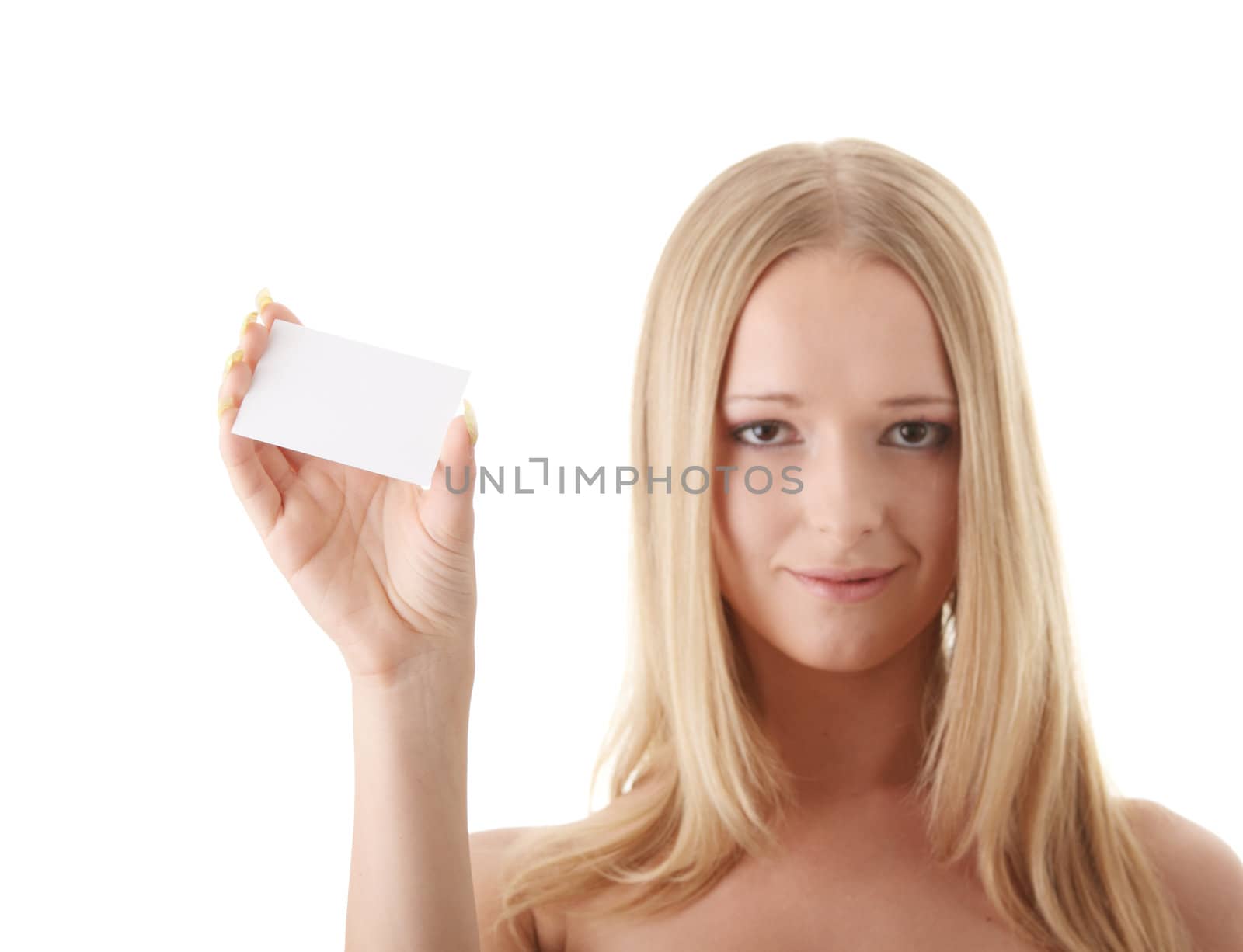 Young blond woman with businesscard in hand - focus on card