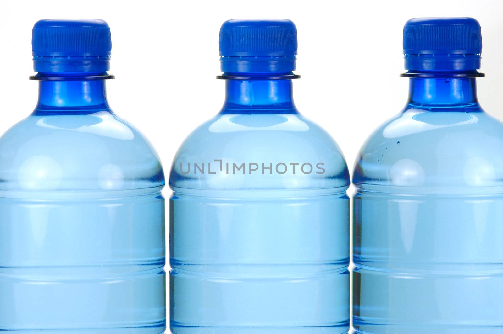 Bottle drinking water isolated against a white background