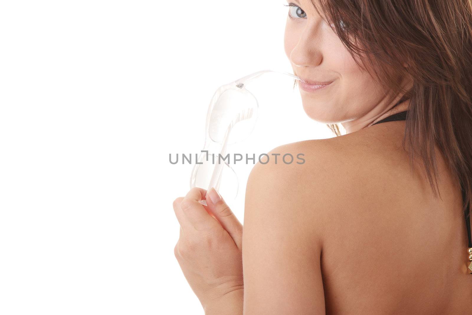 Sexy brunet model in a bikini isolated over white