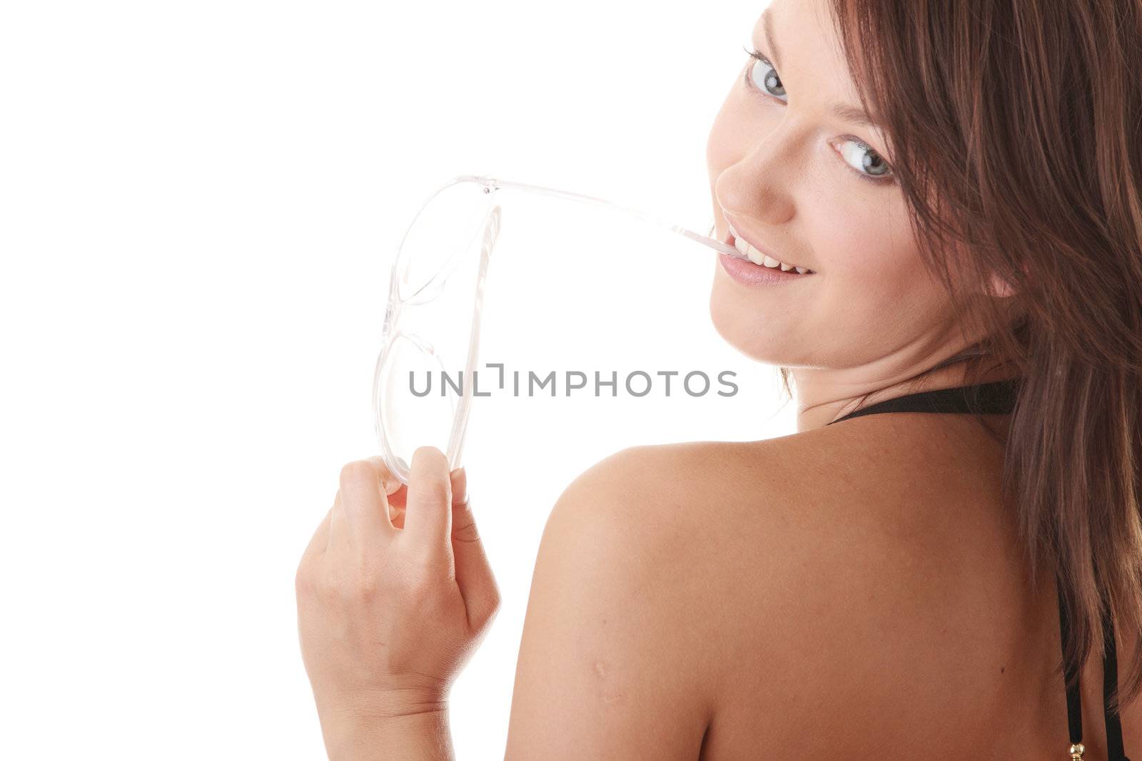 Sexy brunet model in a bikini isolated over white