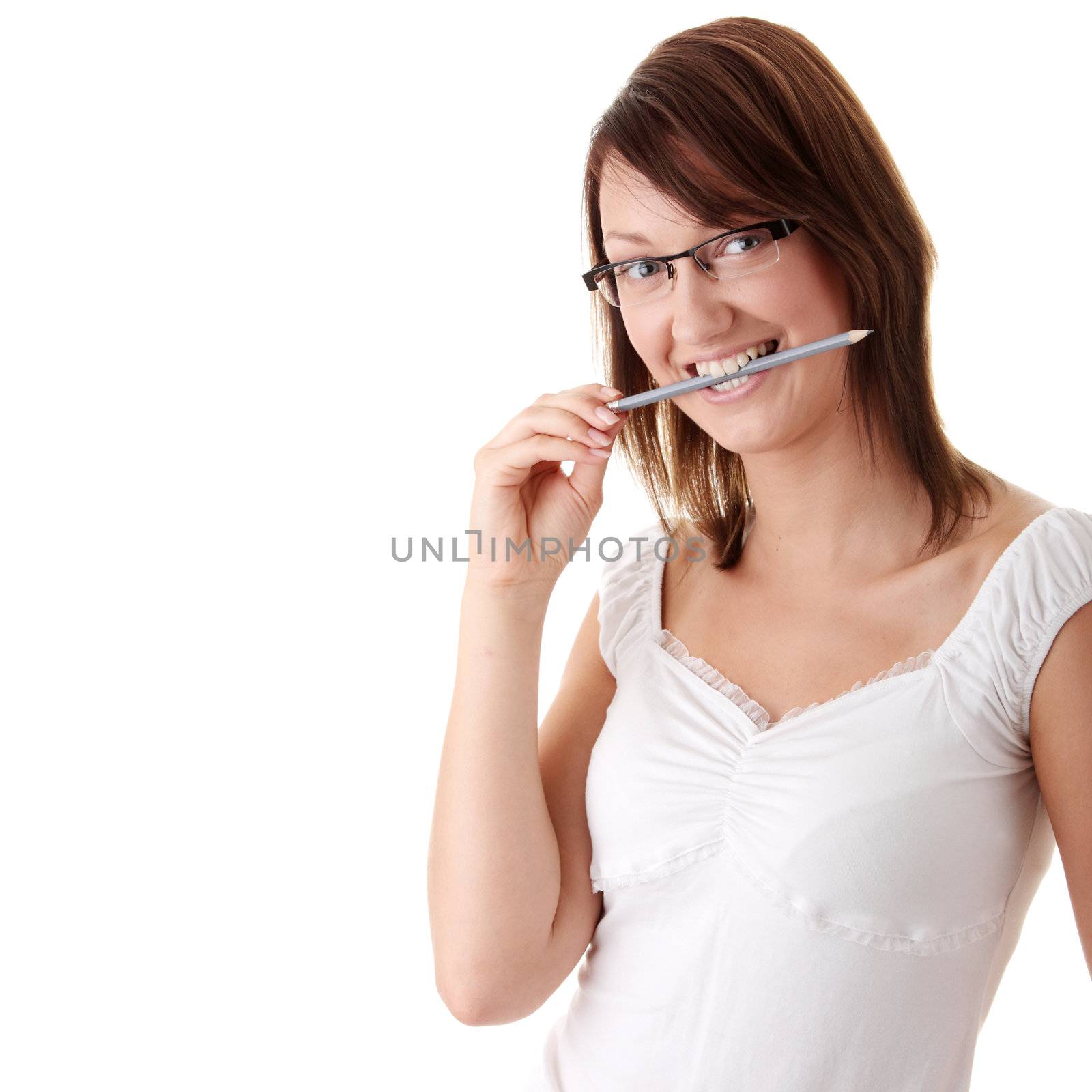 The young beautiful student with pencil on a white background