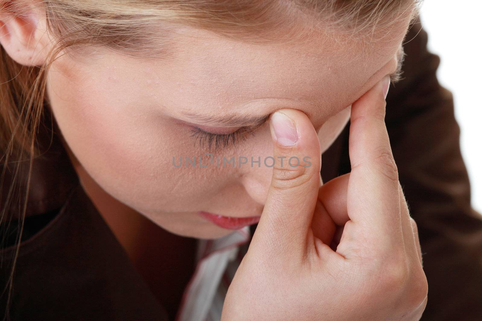 Woman with severe Migraine Headache holding hands to head
