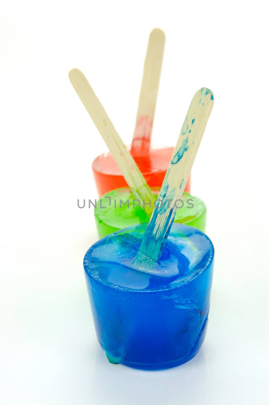 Flovored icy poles isolated against a white background