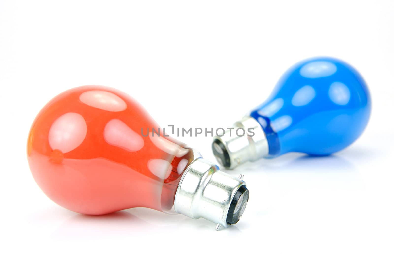 Colored light bulbs isolated against a white background