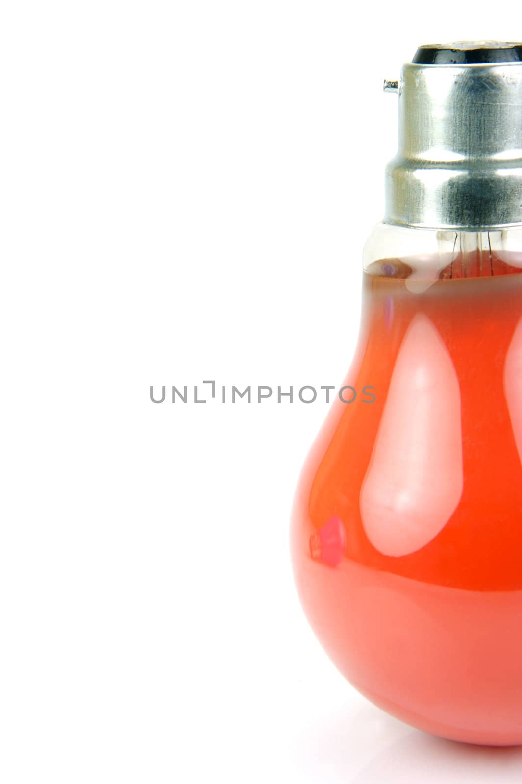 Colored light bulbs isolated against a white background