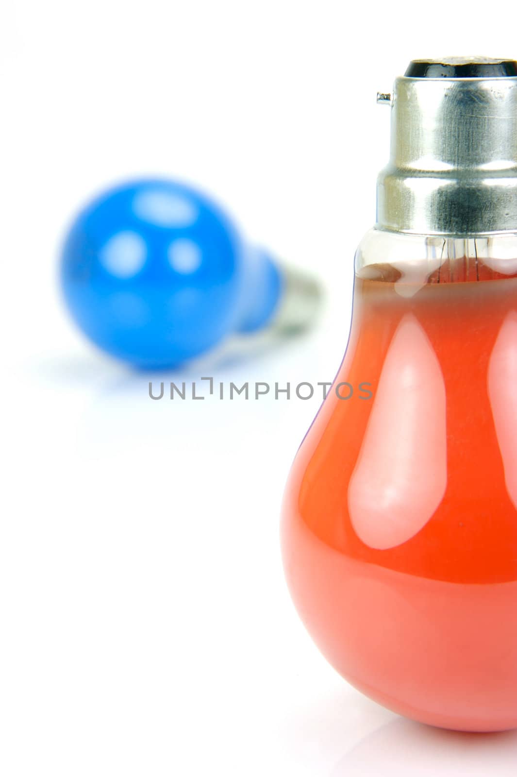 Colored light bulbs isolated against a white background
