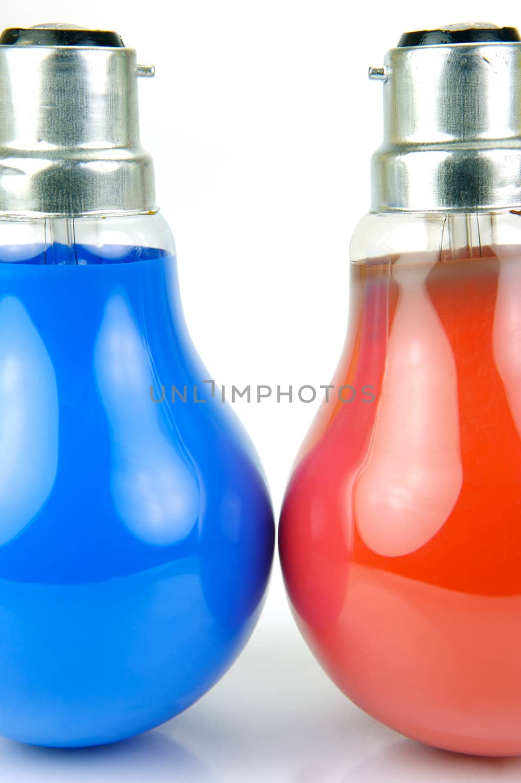 Colored light bulbs isolated against a white background
