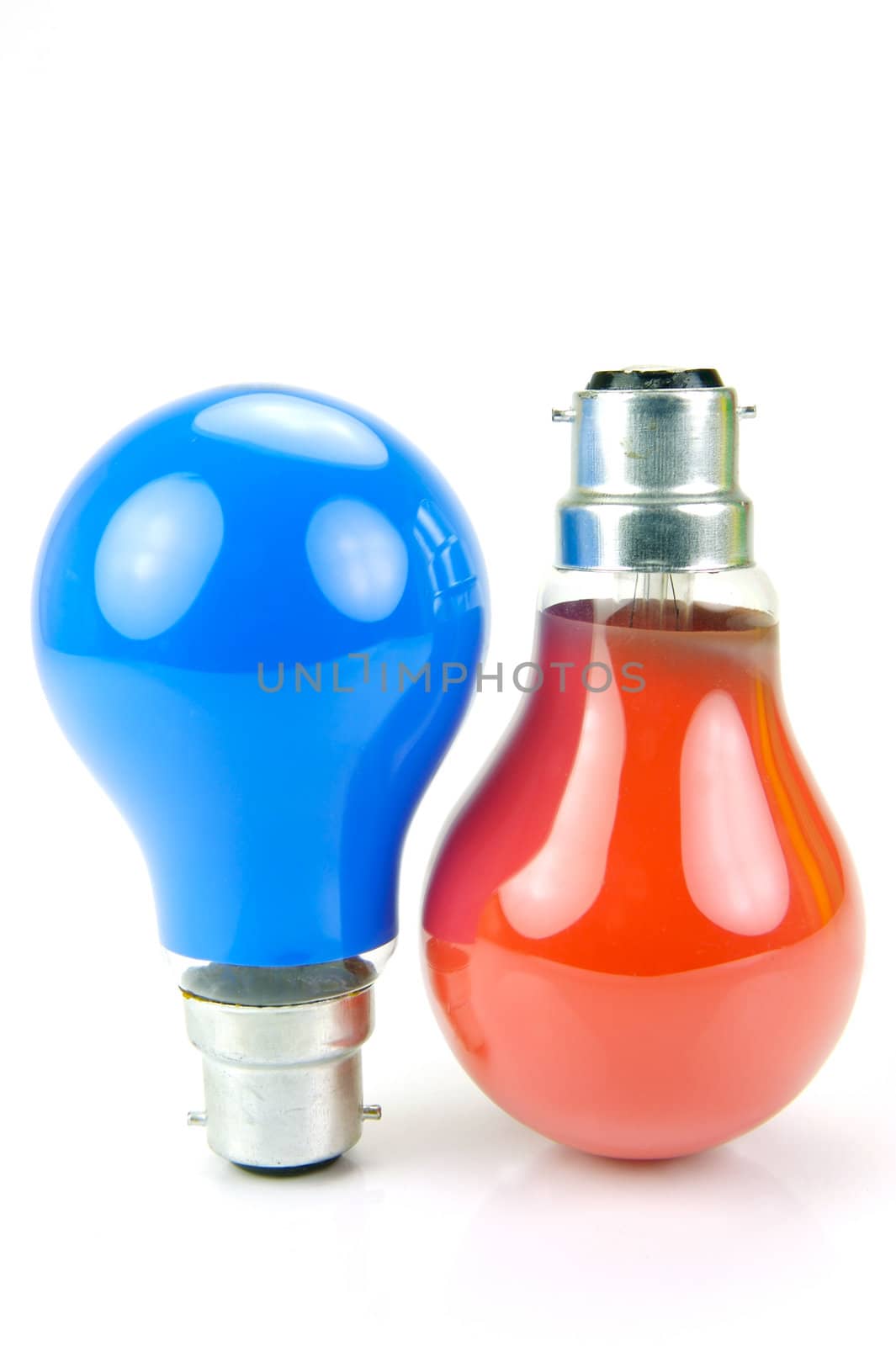 Colored light bulbs isolated against a white background