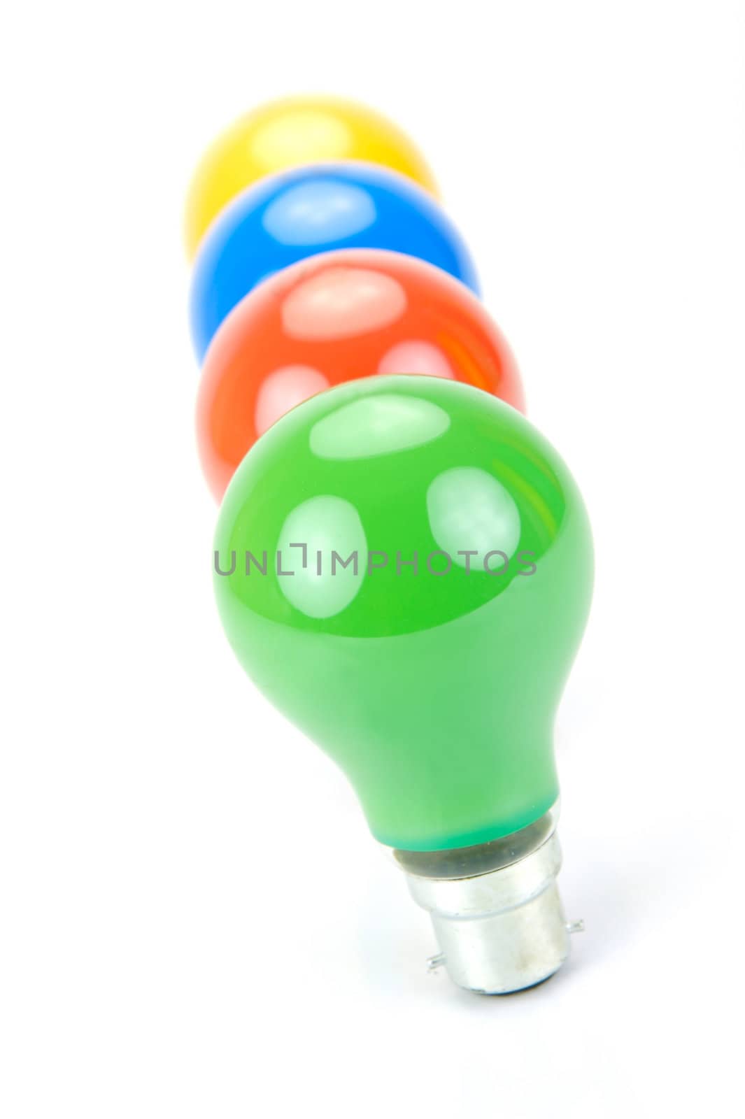 Colored light bulbs isolated against a white background