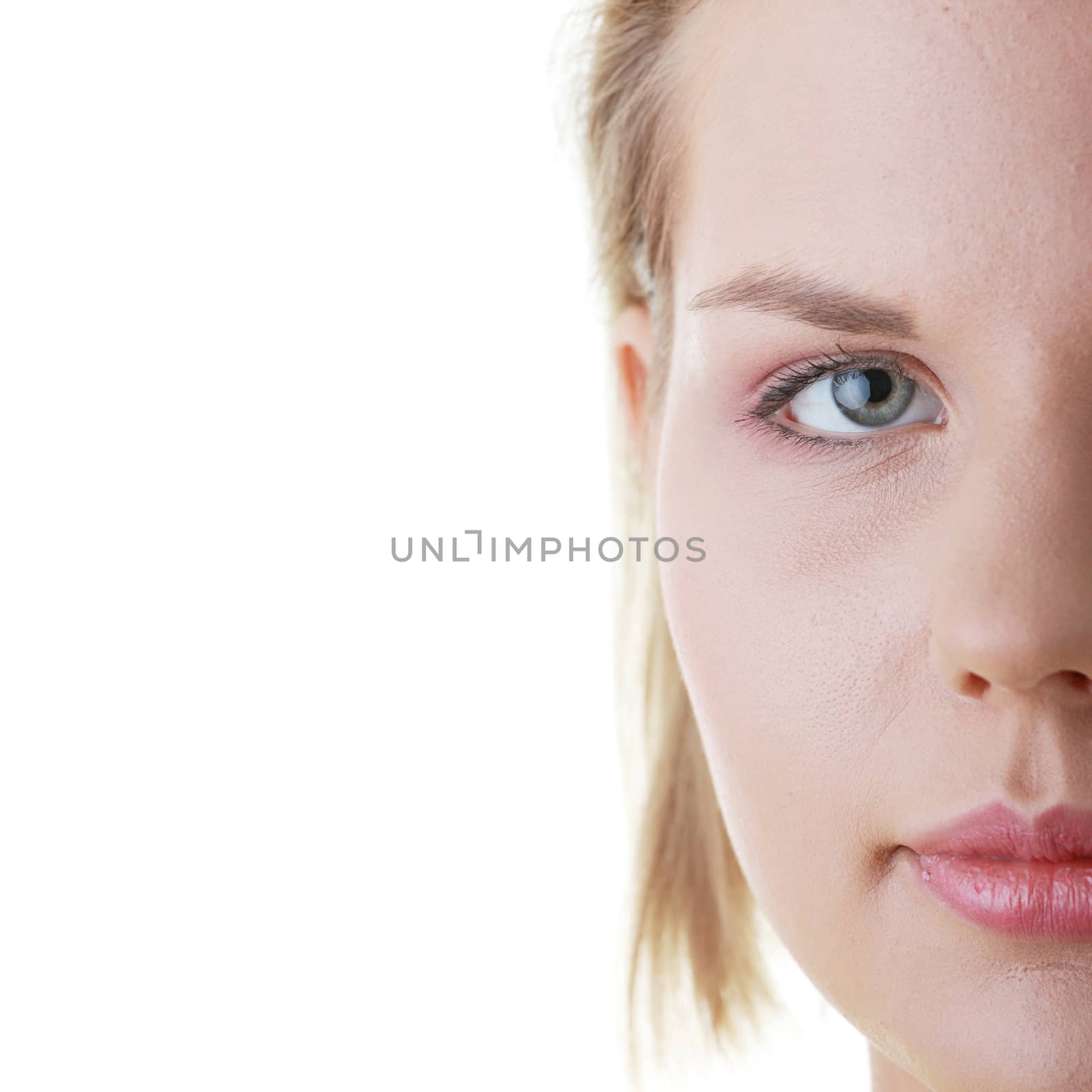 Casual young woman face close up isolated on white