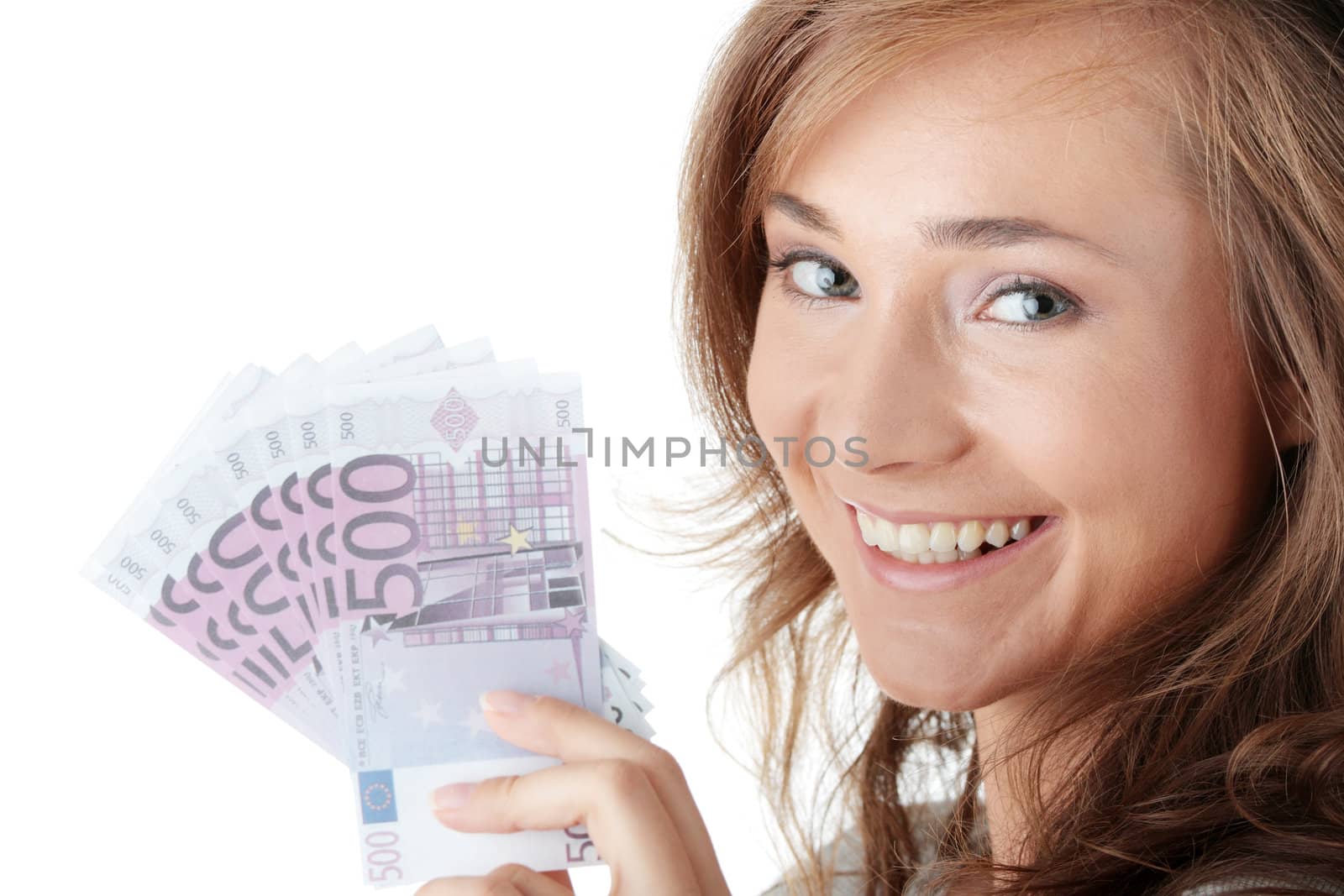Happy young woman holding money isolated on white