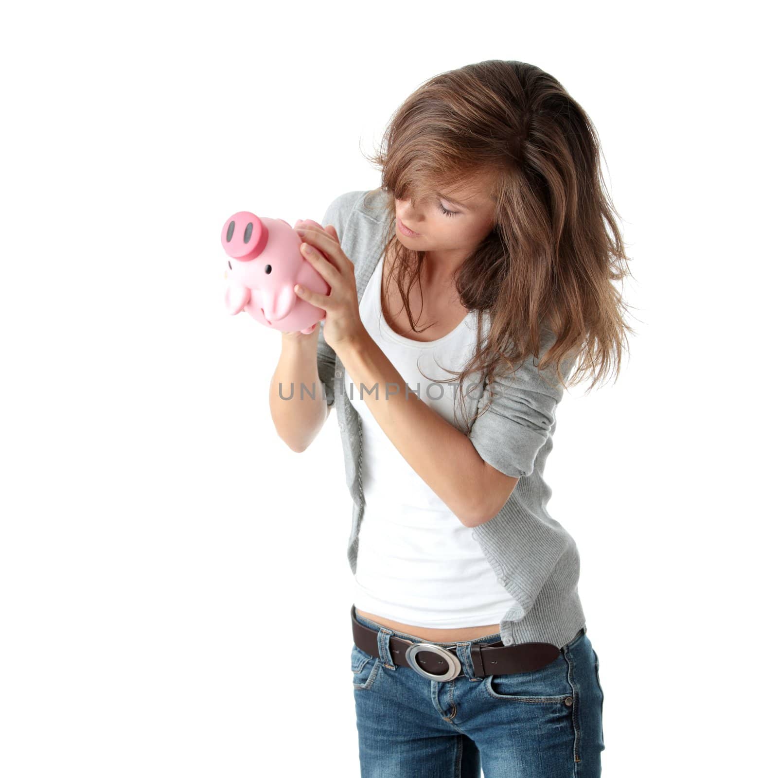 Young beautiful woman standing with piggy bank (money box), isolated on white background