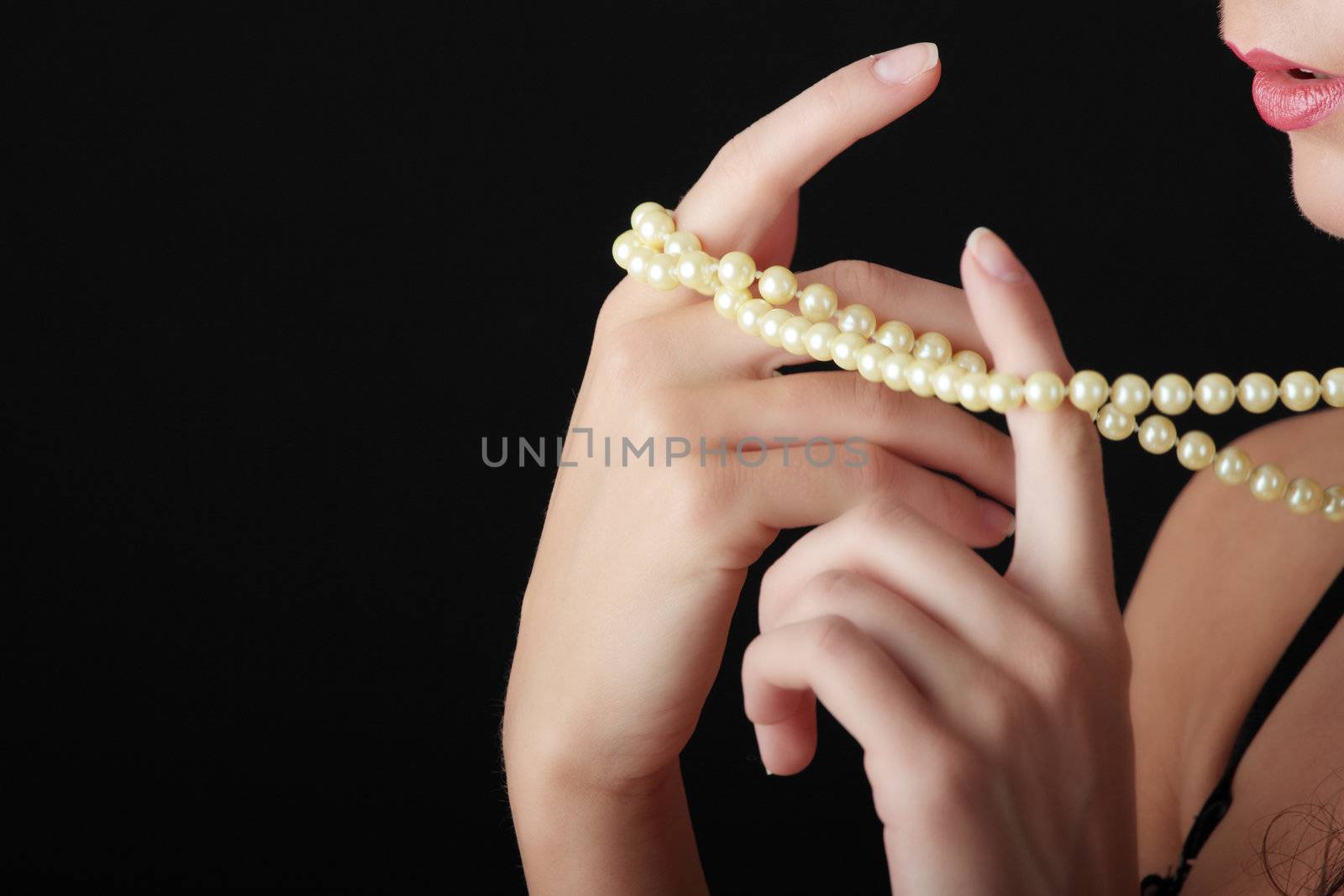 The dreaming woman with a pearl necklace