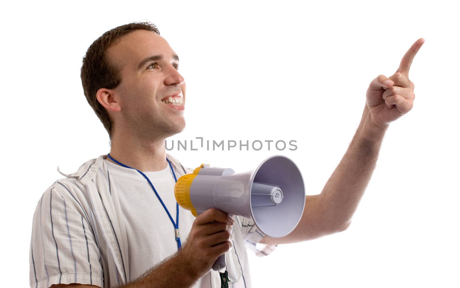 A young man holding a megaphone and pointing at white copyspace