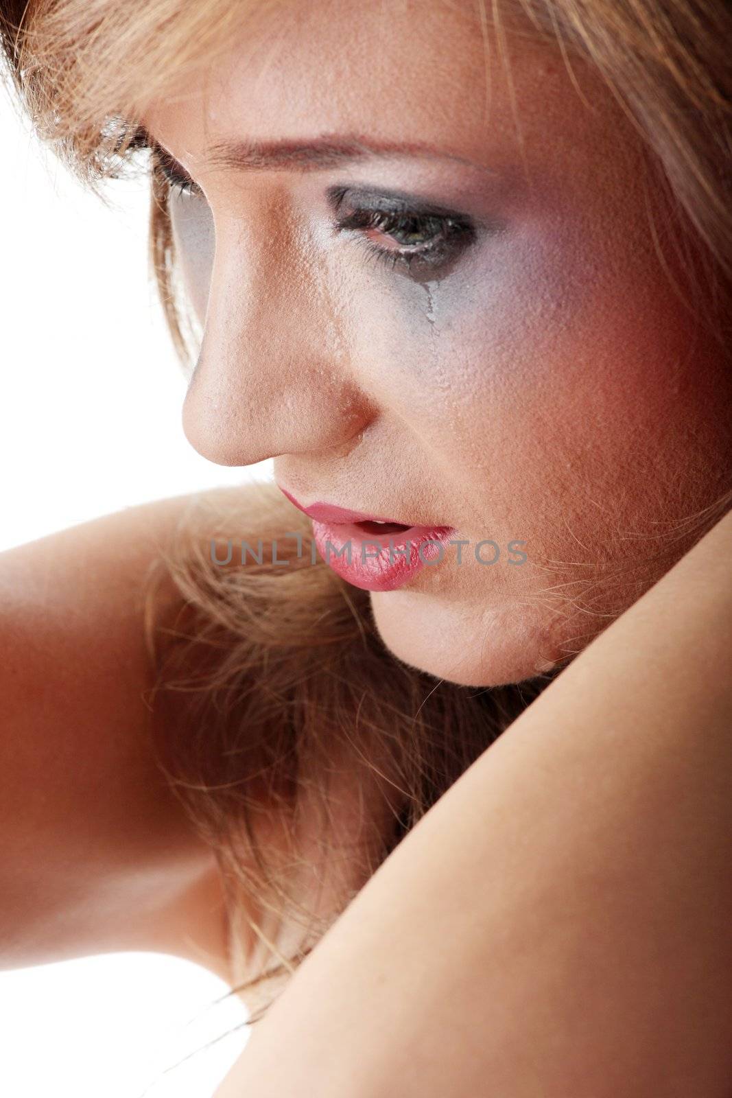 Emotional portrait of abused, crying, beautiful, young ,caucasian woman in underwear - violence concept