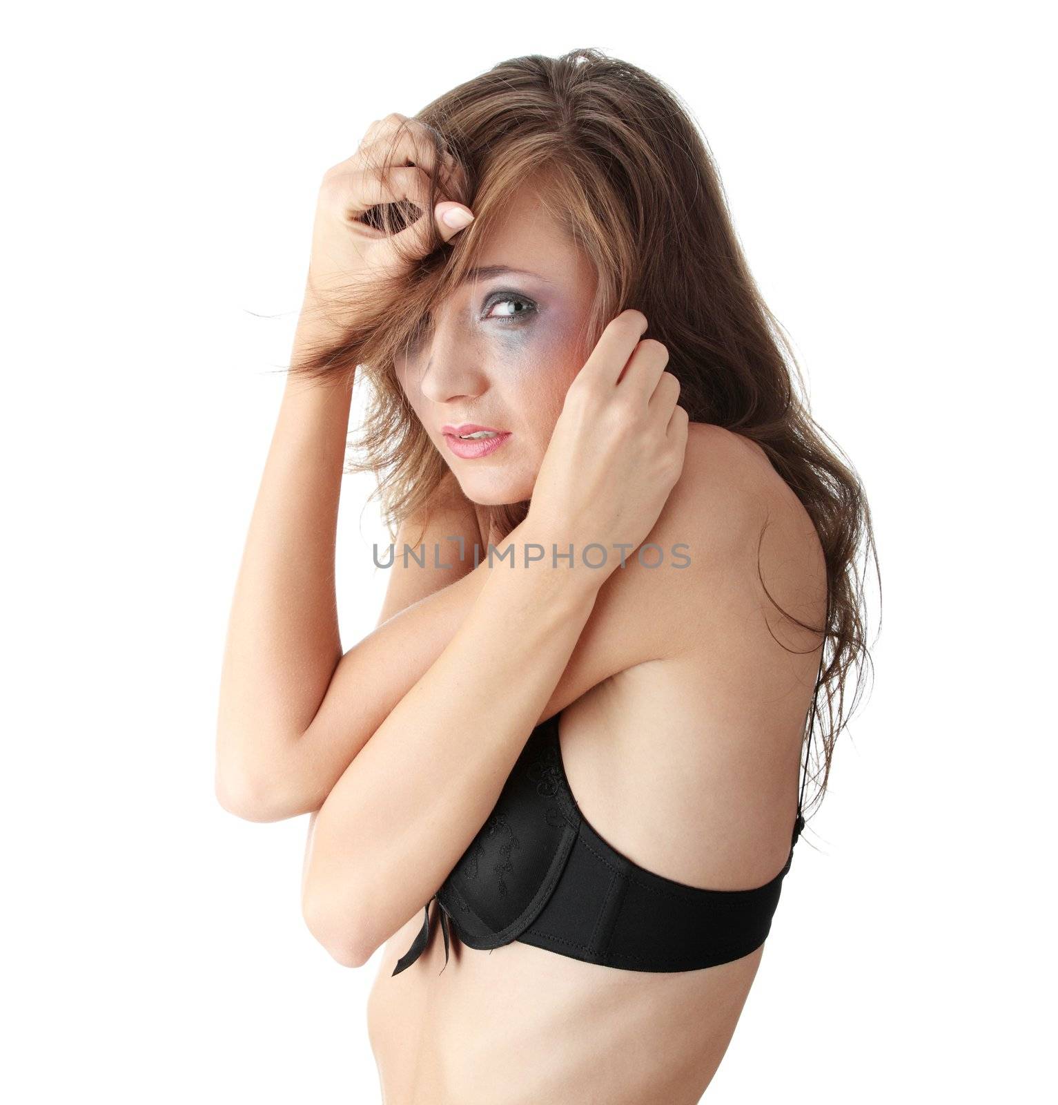 Emotional portrait of abused, crying, beautiful, young ,caucasian woman in underwear - violence concept