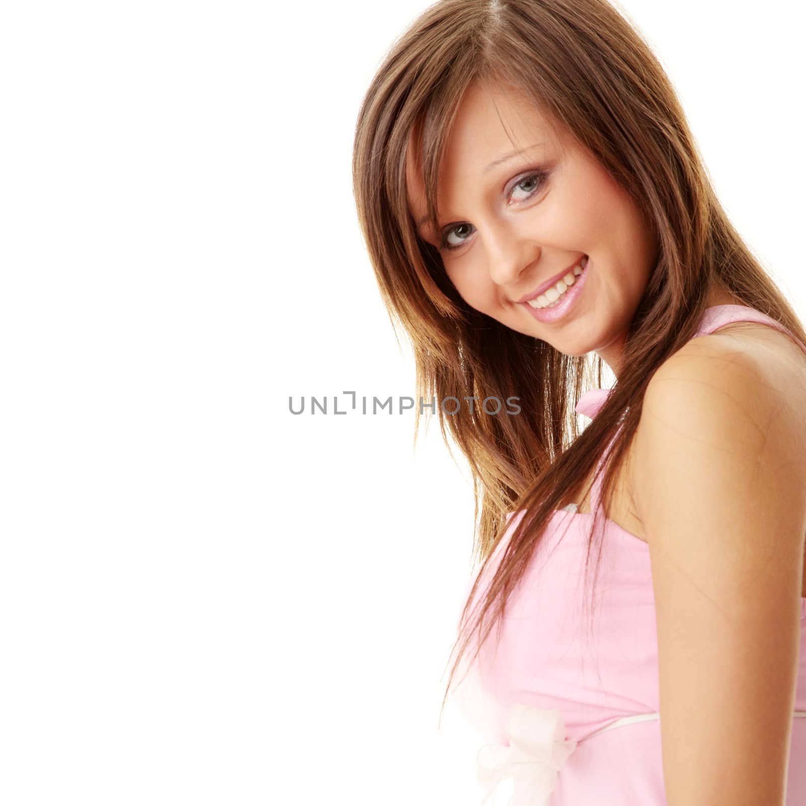 Beautiful brunette girl in sweet pink. Isolated on white background