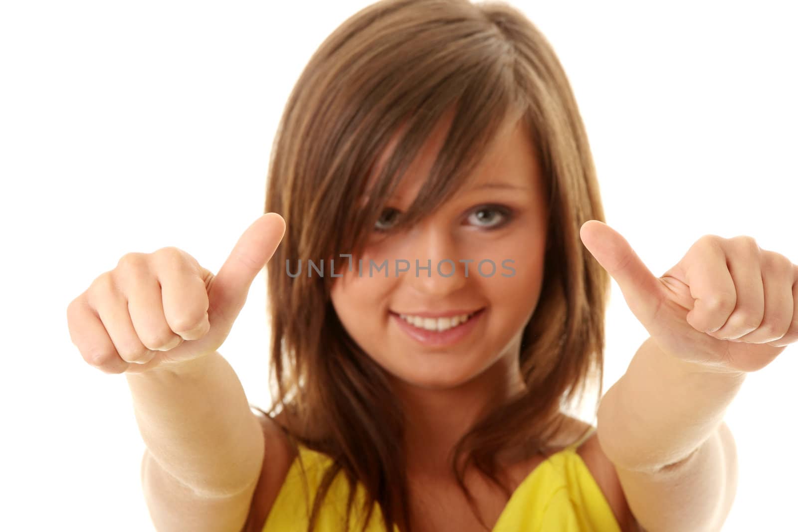 Girl showing OK sign isolated on white