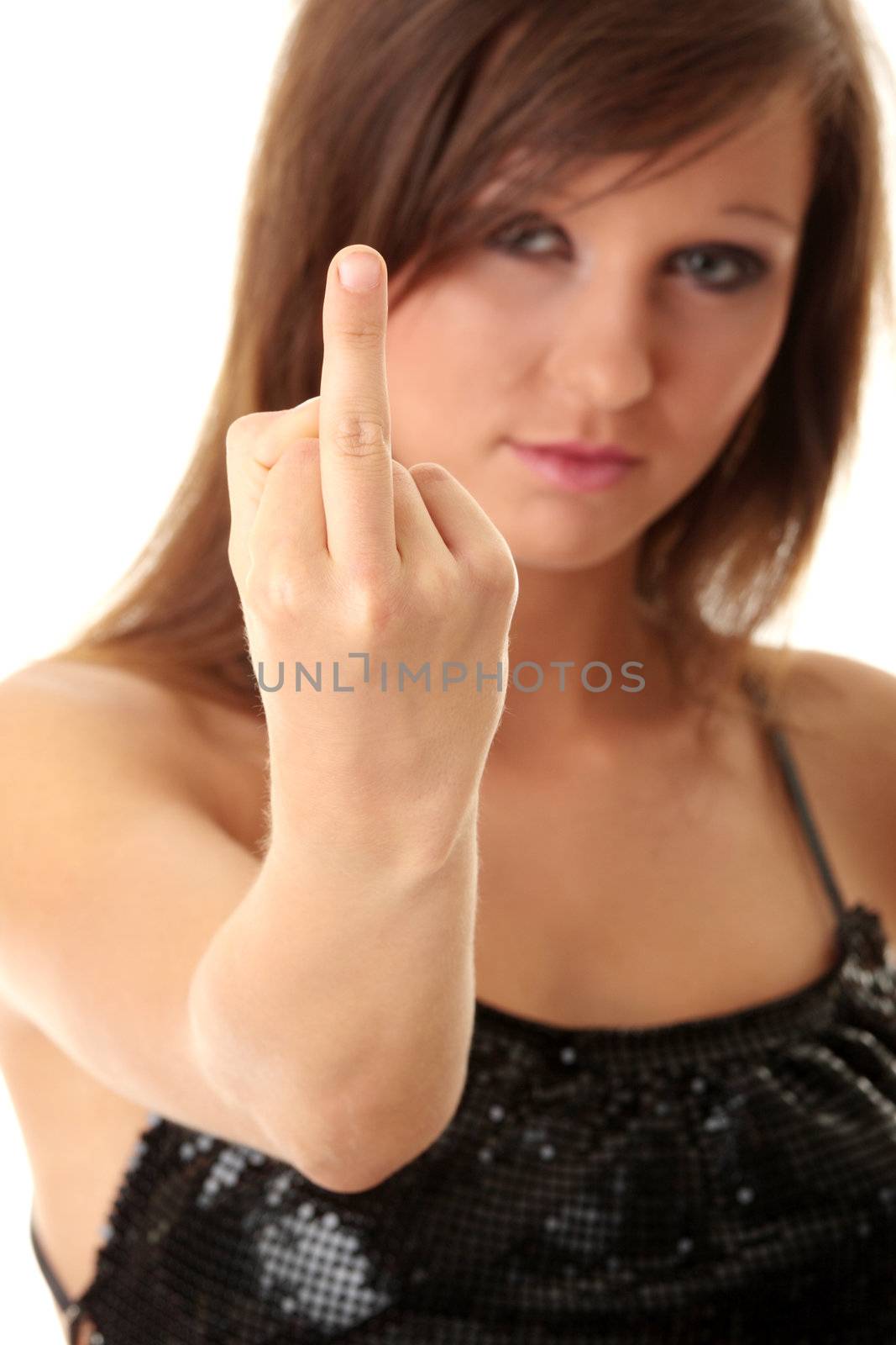 Beautiful, young woman posing with middle finger up