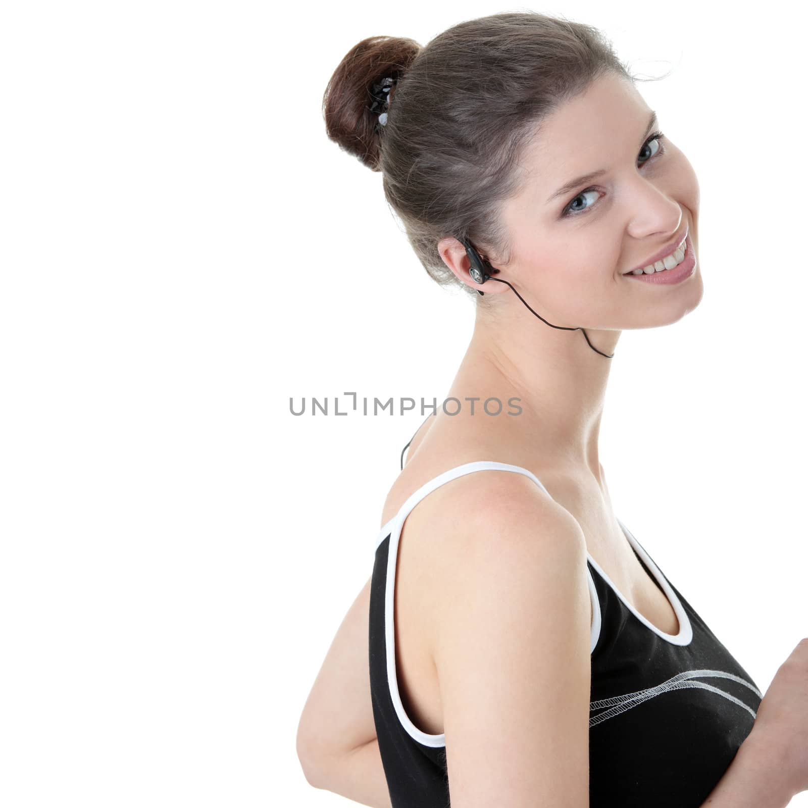 Young fitness woman with sport headphones by BDS