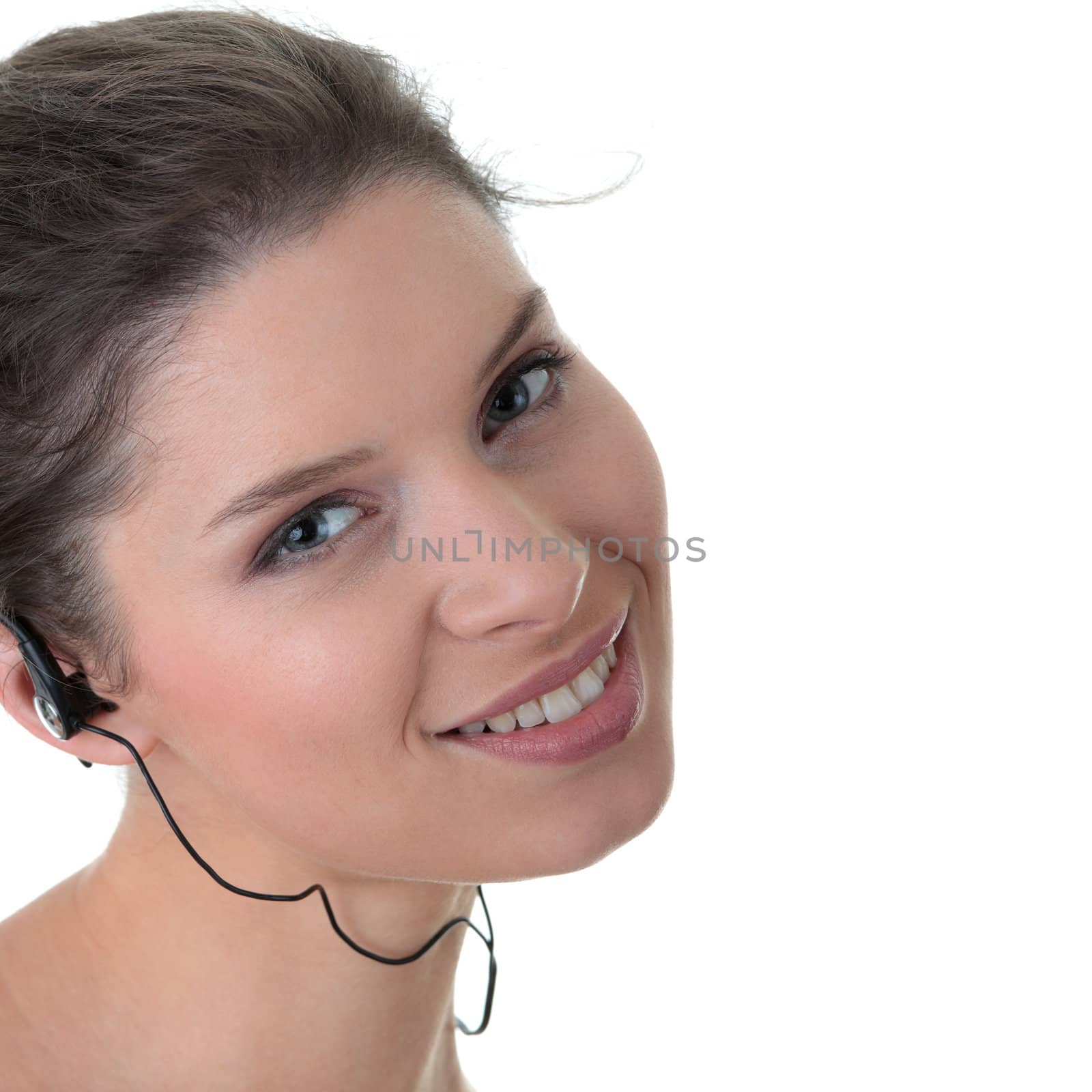 Young fitness woman with sport headphones listening music
