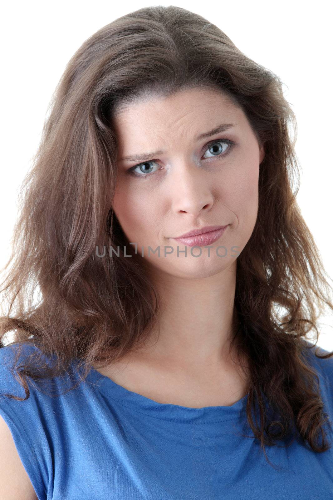 Casual caucasianbrunette woman suprised over white background