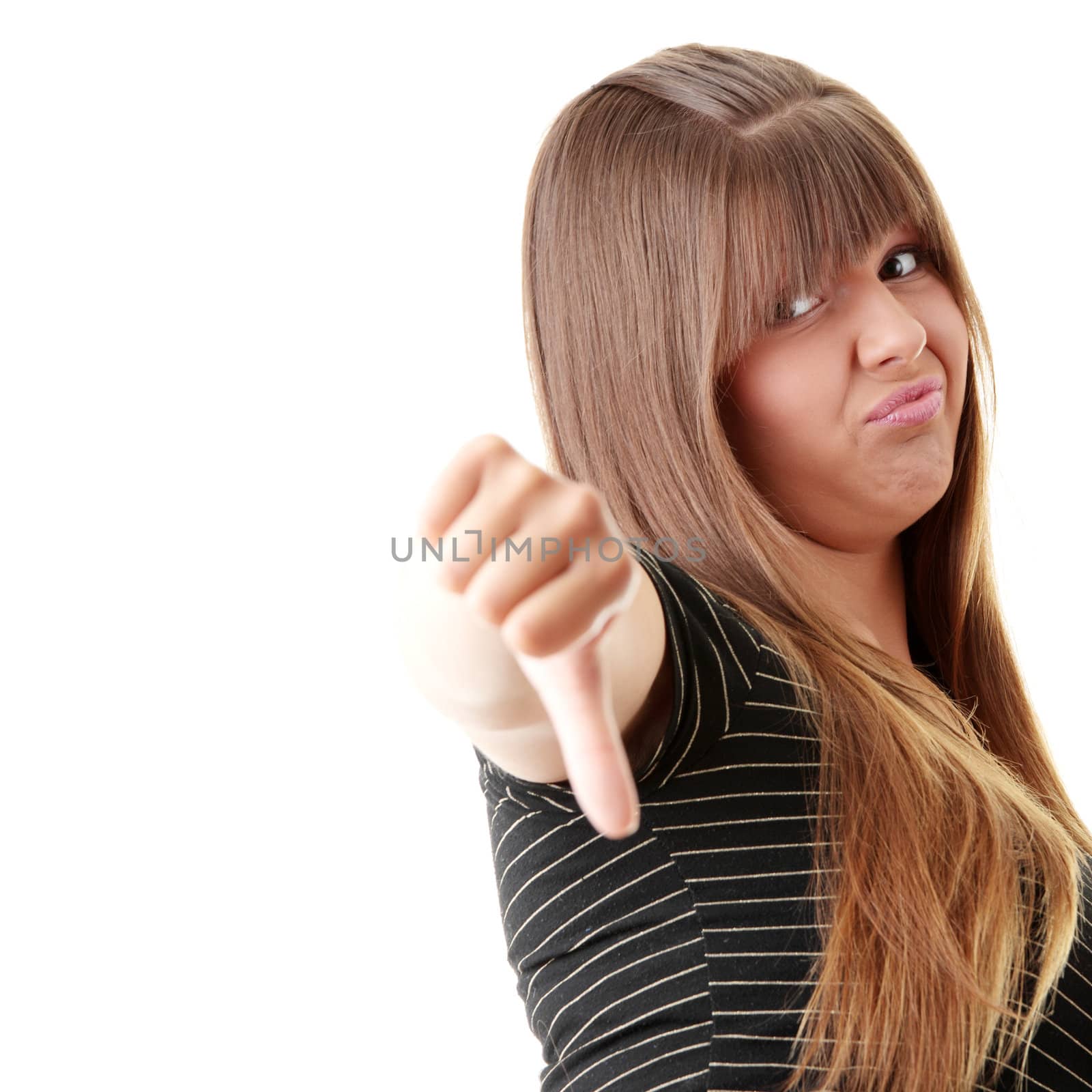Young woman showing thumbs down isolated