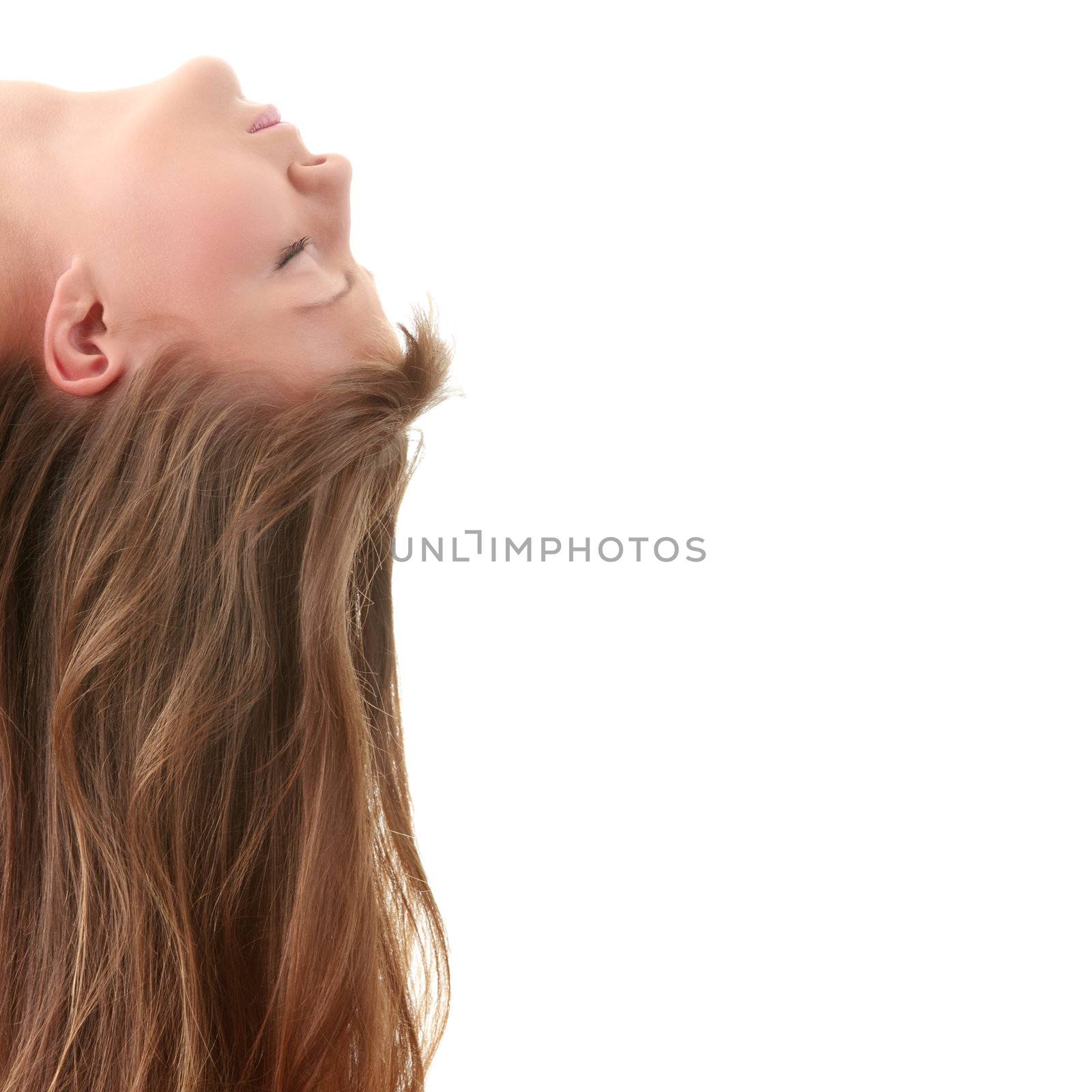 Beautiful young female face with long beauty hair