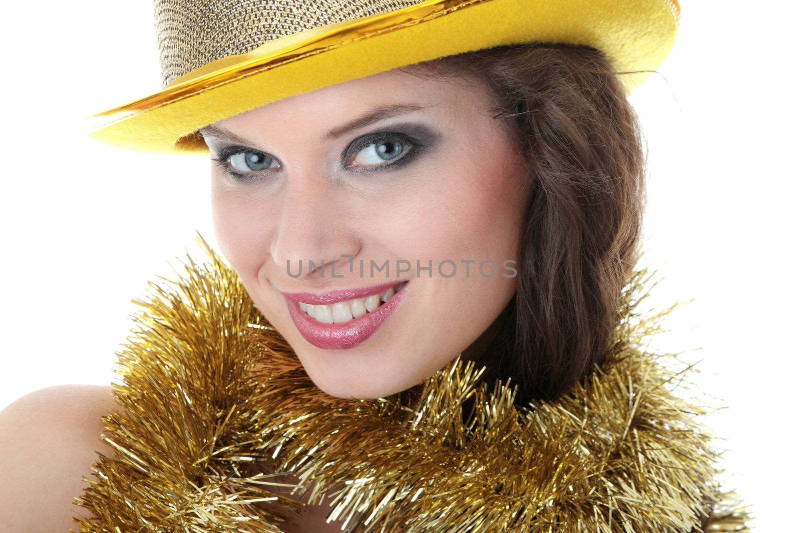 Young beautiful caucasian woman in black elegant party dress and gold hat